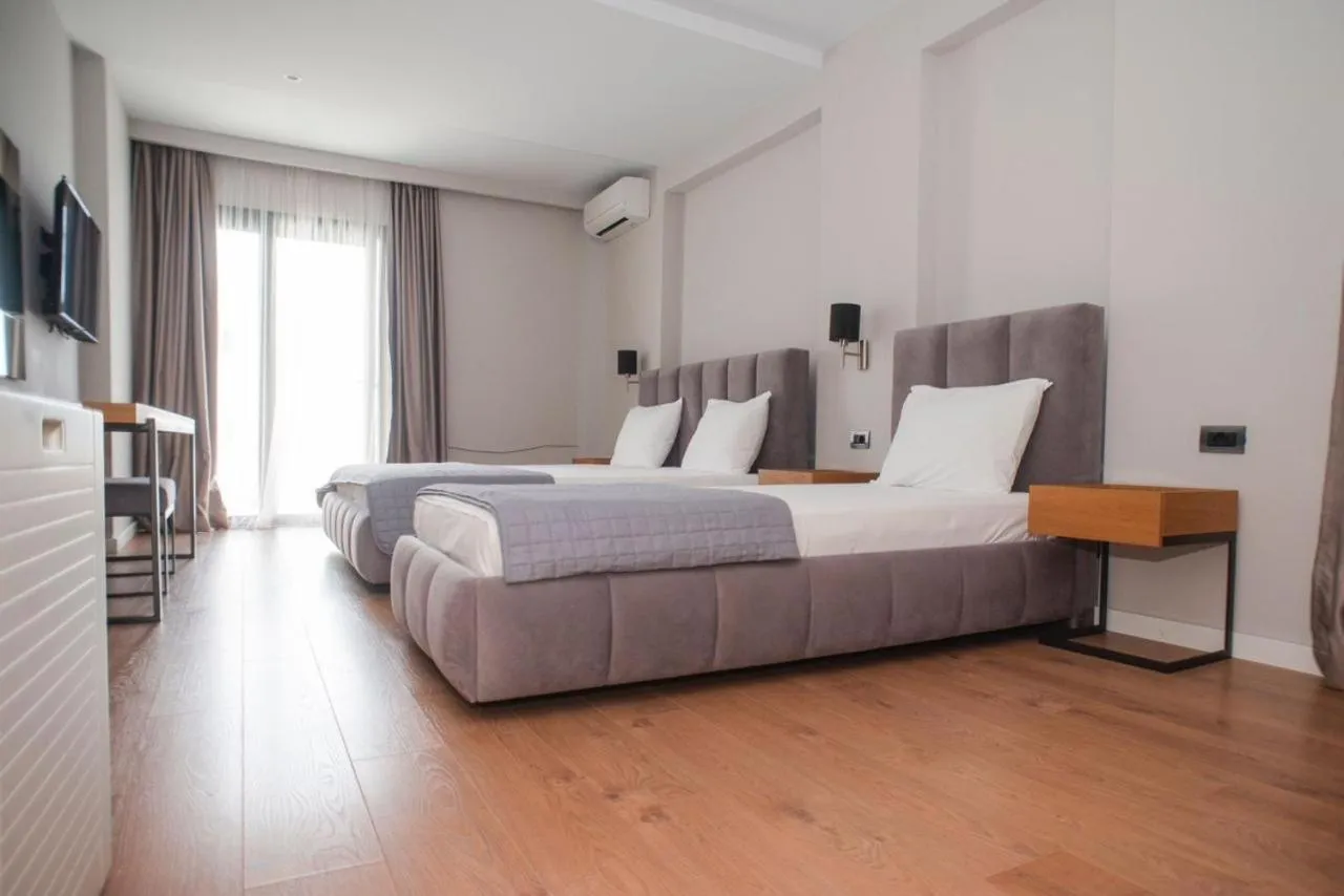 Bed in Hotel Saranda International