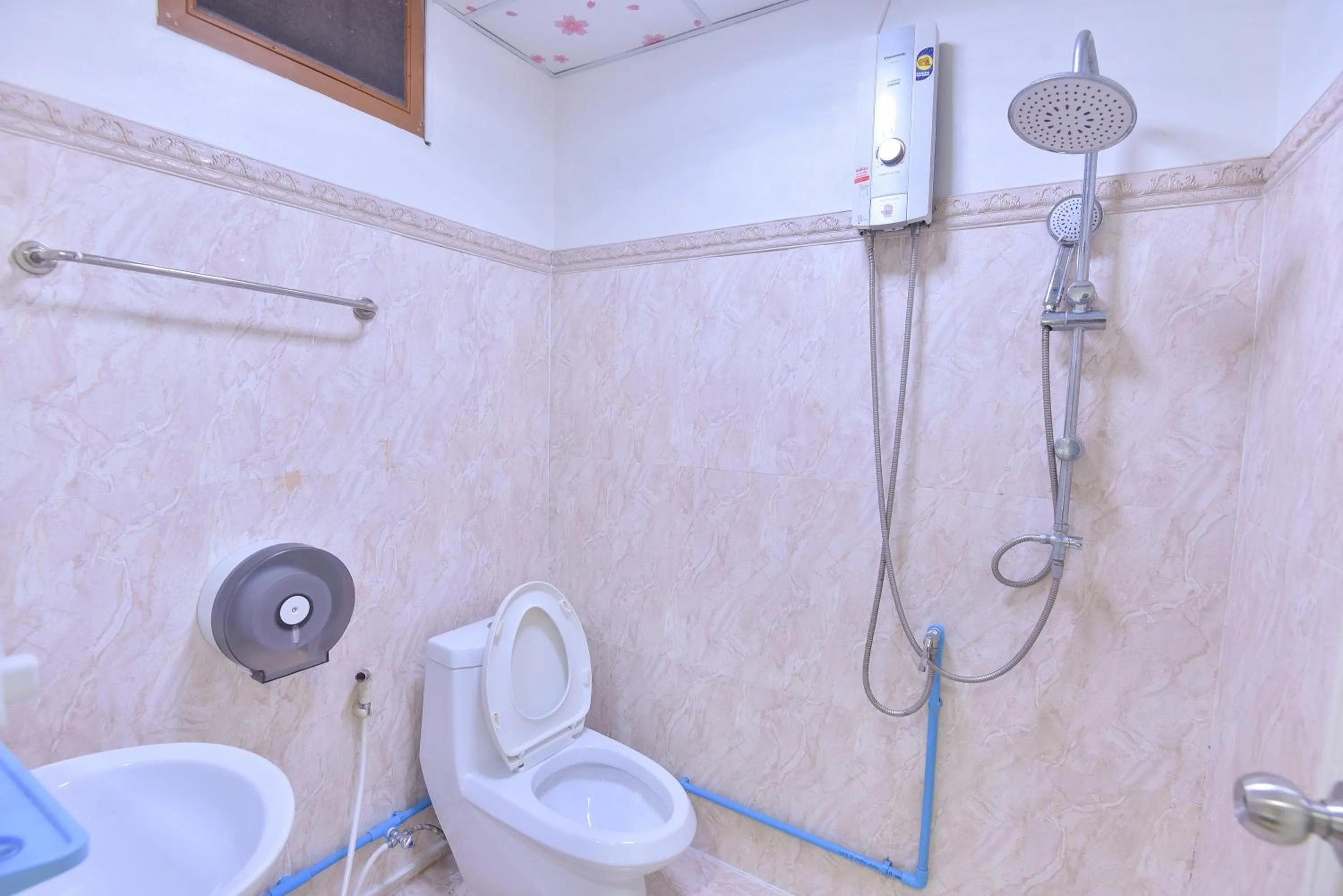 Toilet in P.U. Inn Resort