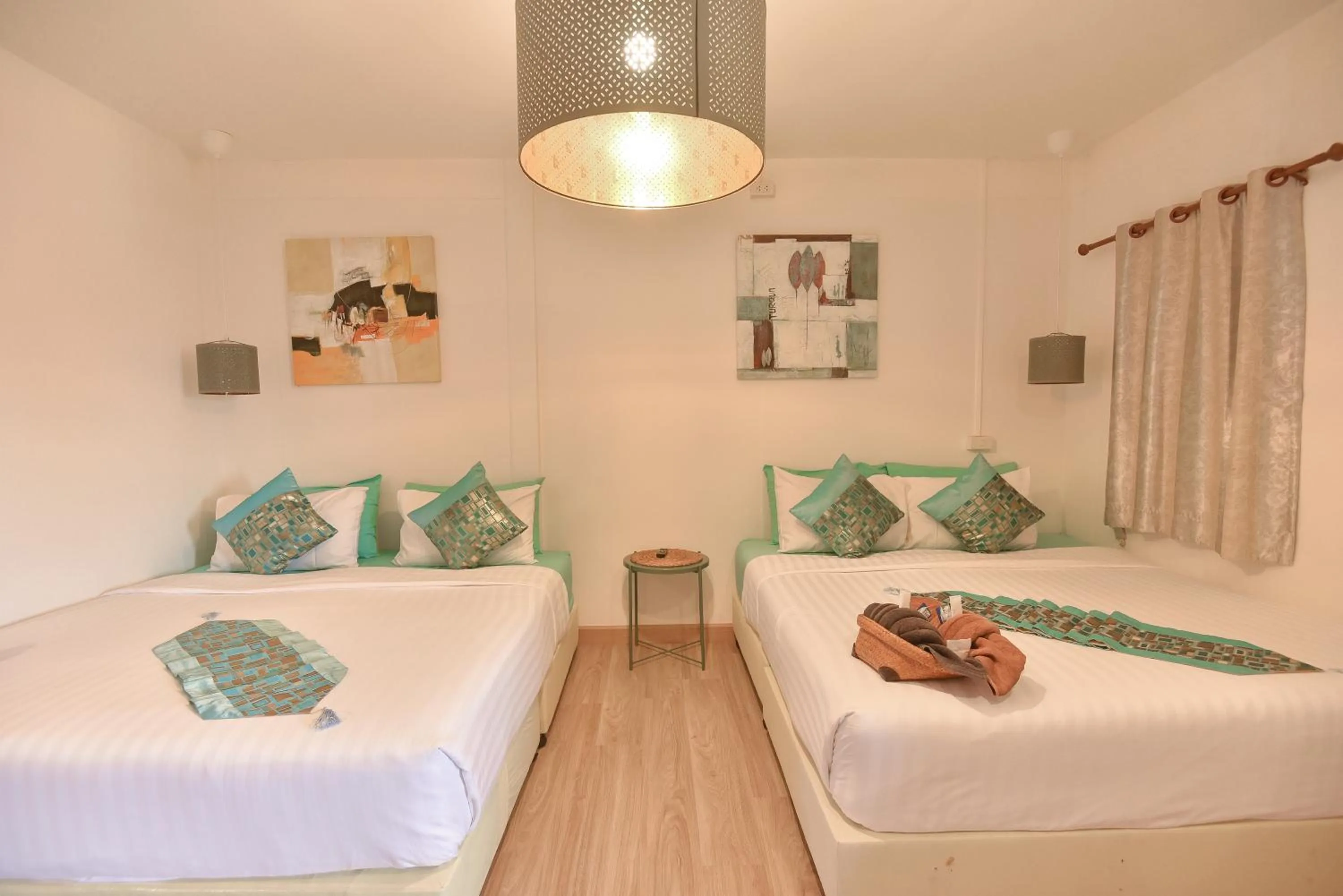 Photo of the whole room, Bed in P.U. Inn Resort