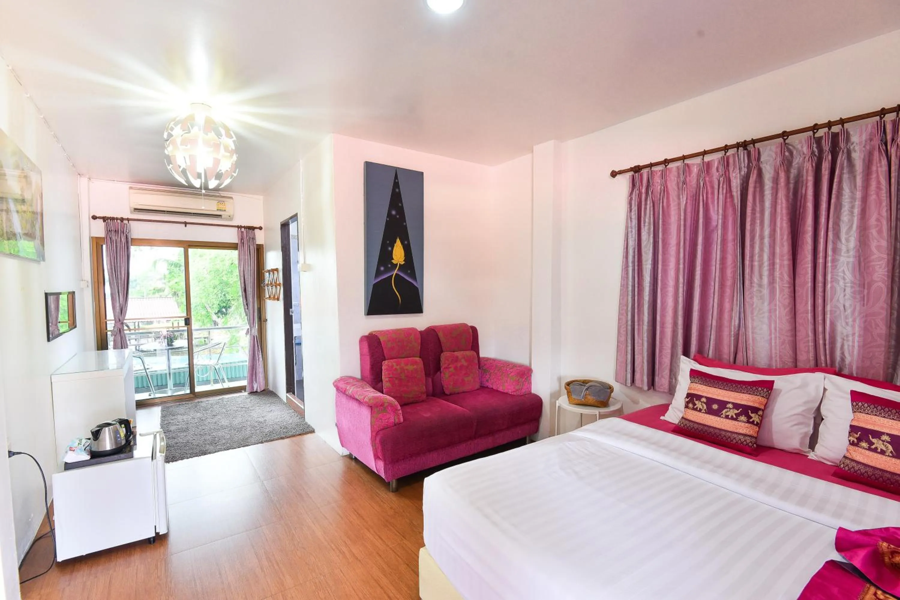 Photo of the whole room, Bed in P.U. Inn Resort