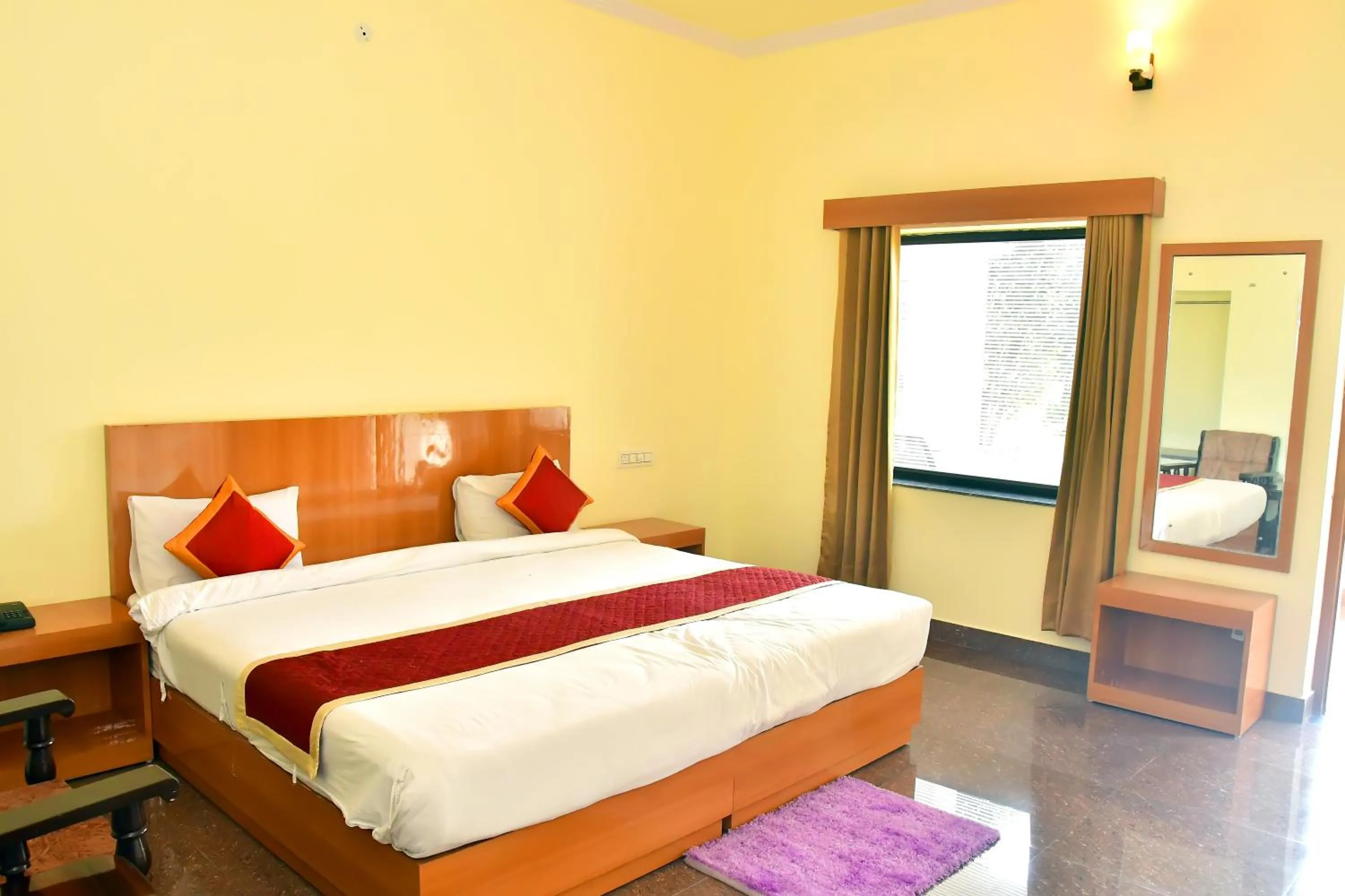 Bed in Motibagh Resort