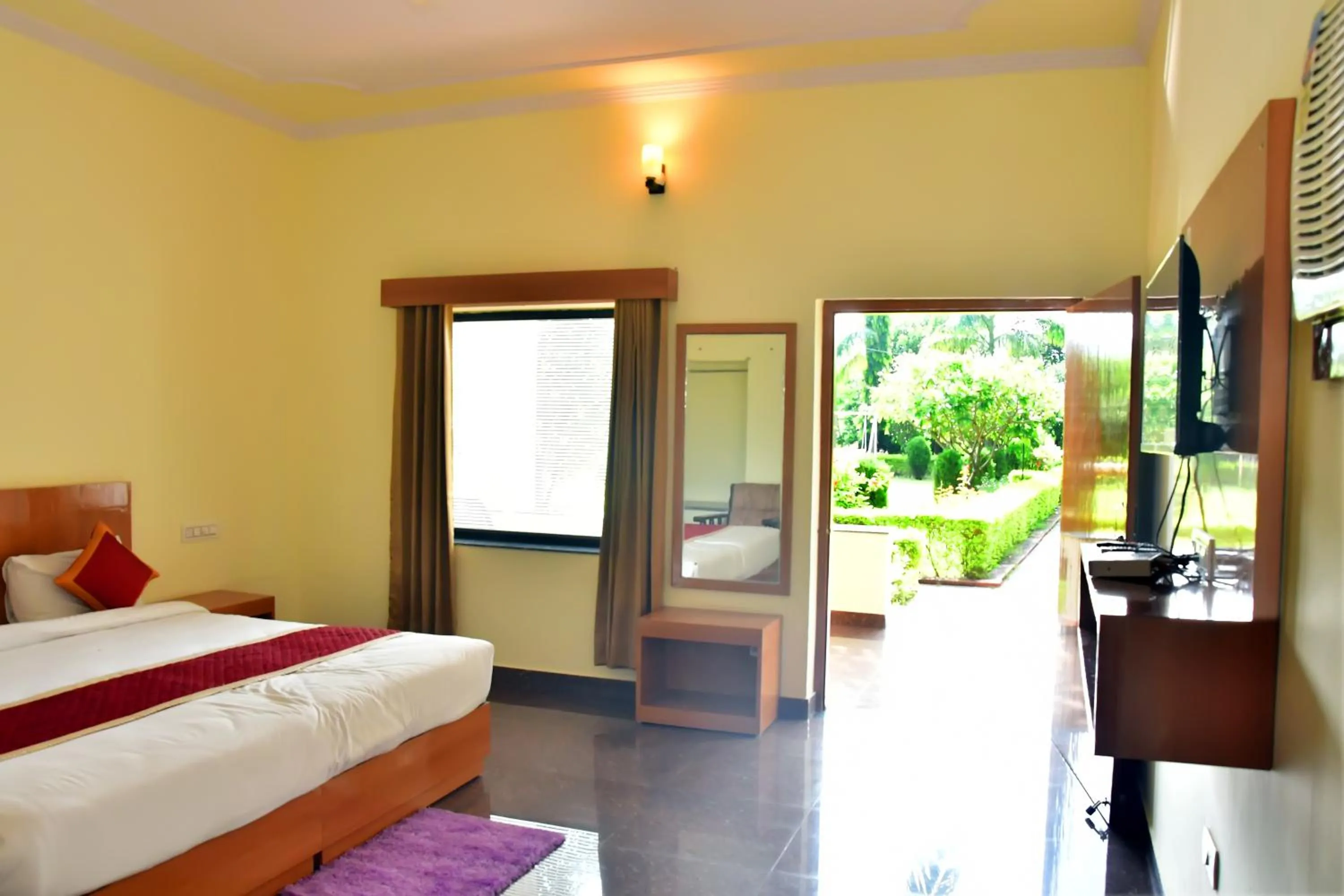 Bed in Motibagh Resort
