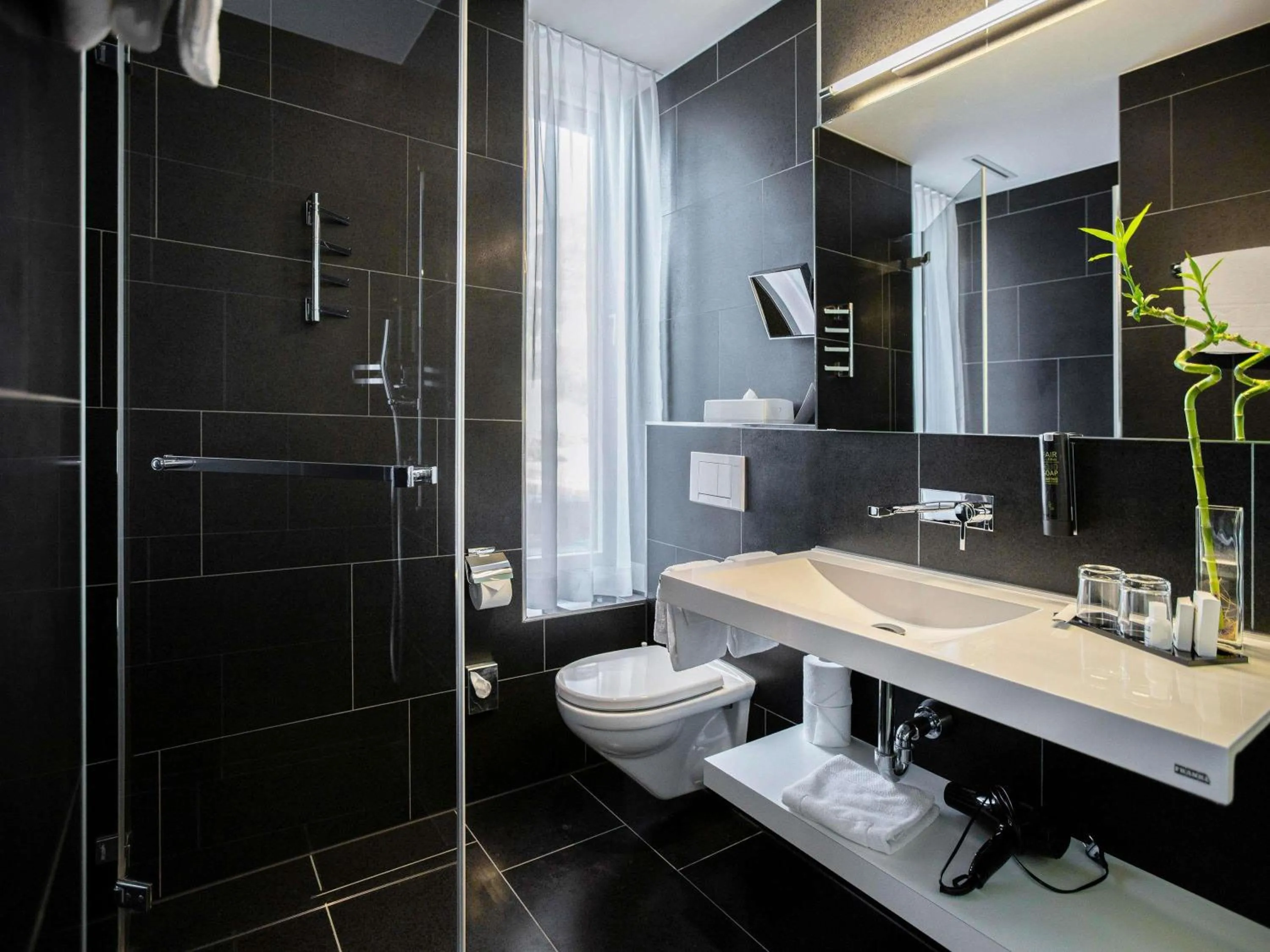 Bedroom in Mercure Chur City West