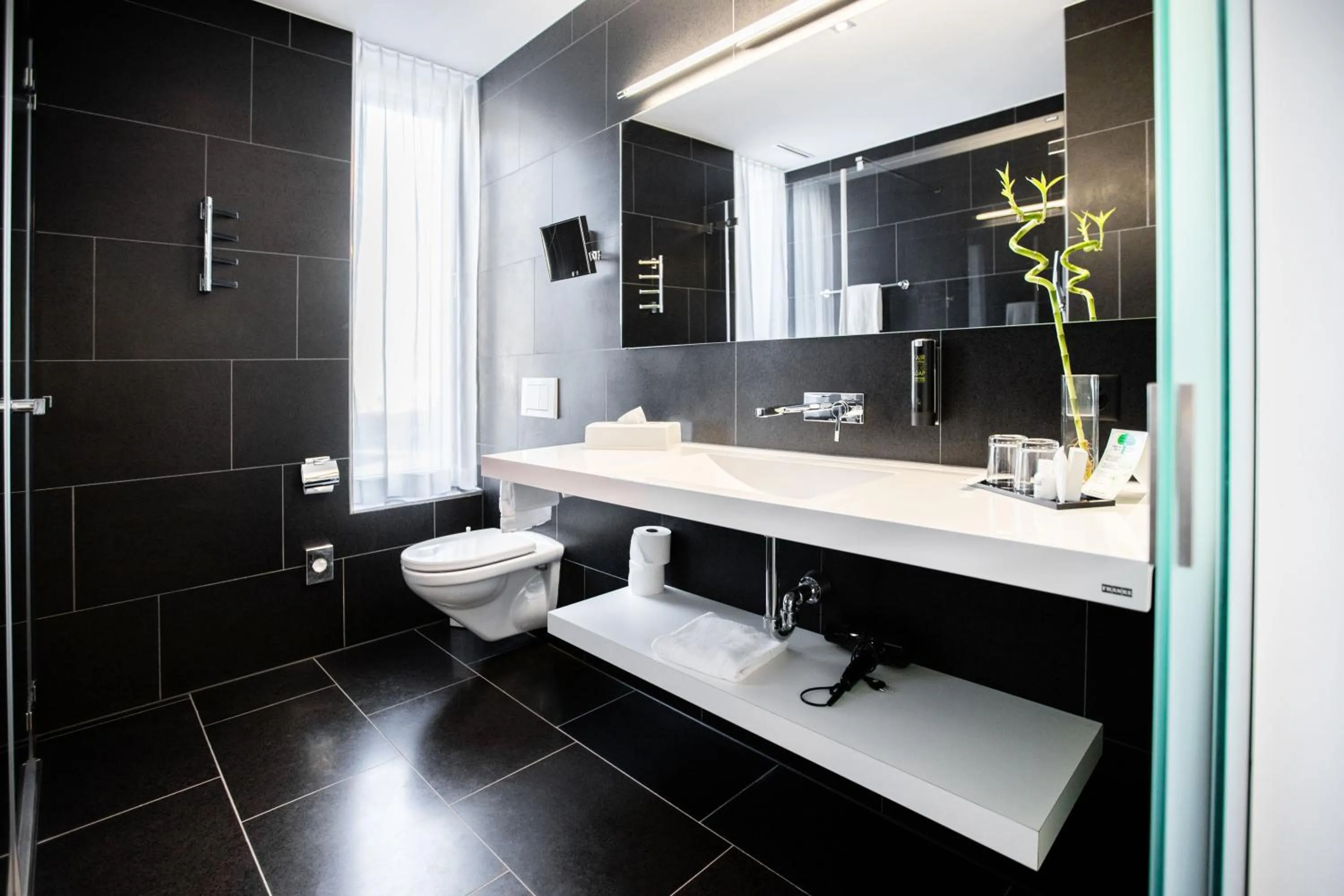 Bathroom in Mercure Chur City West