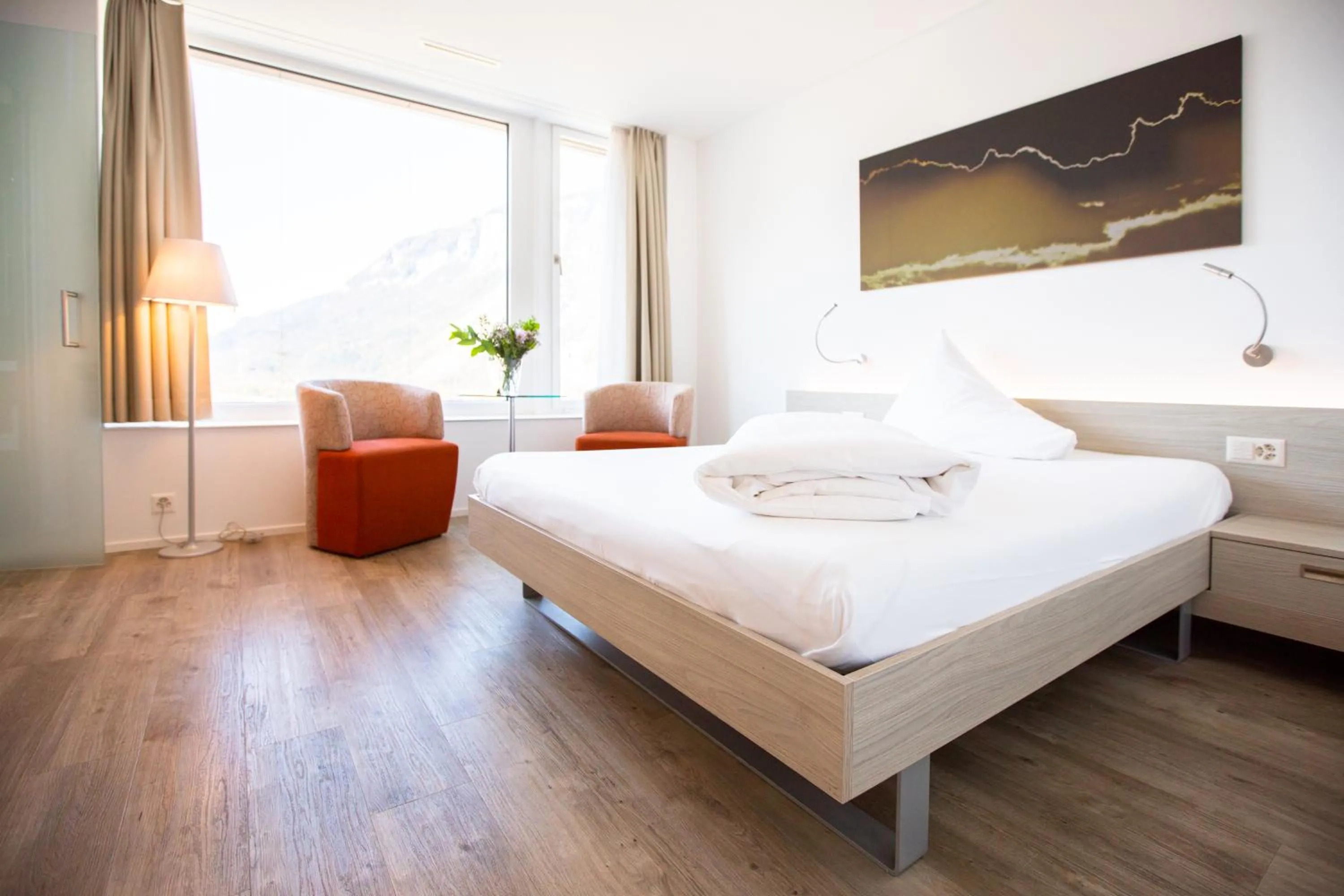 Photo of the whole room, Bed in Mercure Chur City West