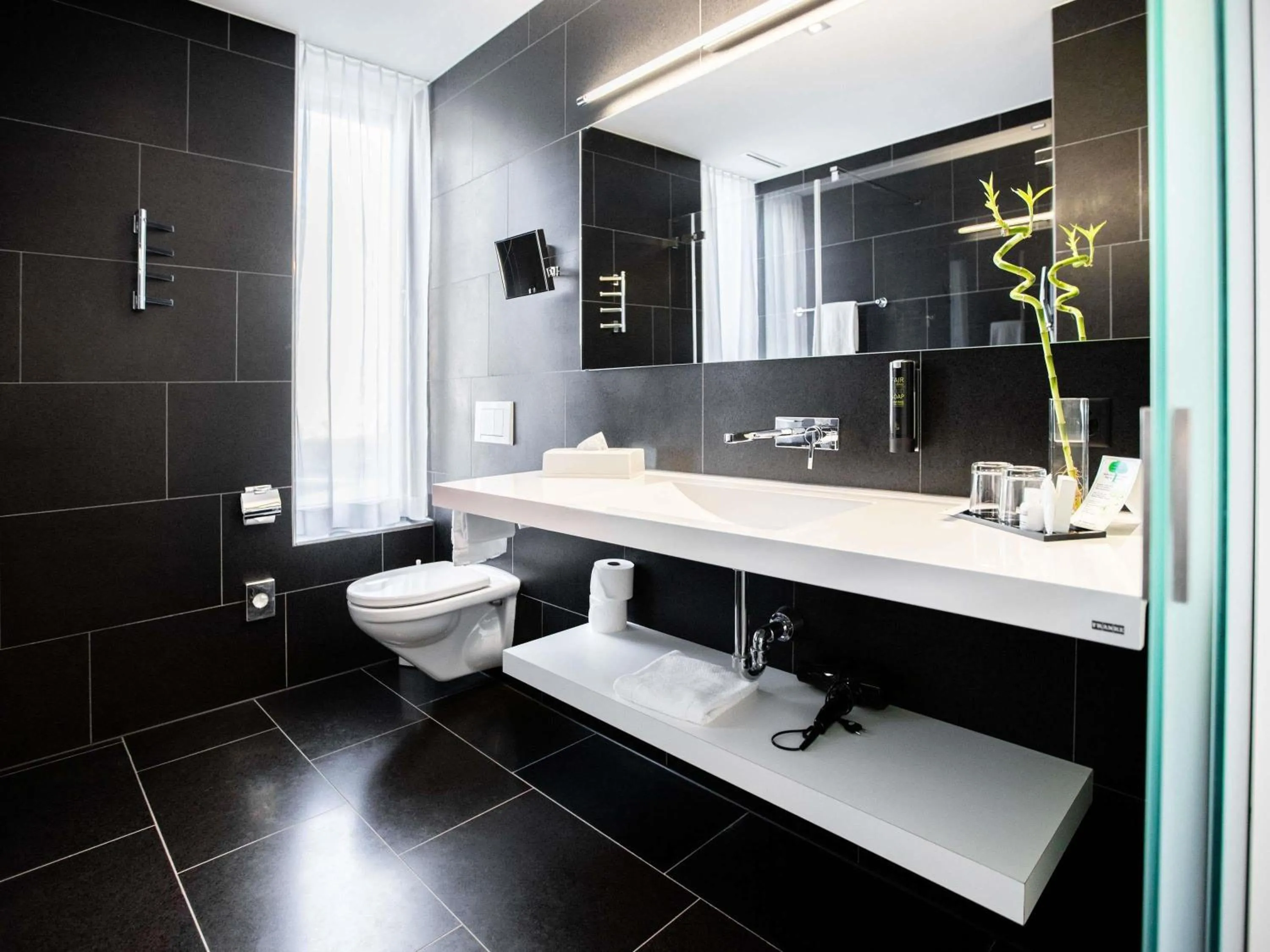 Bedroom in Mercure Chur City West