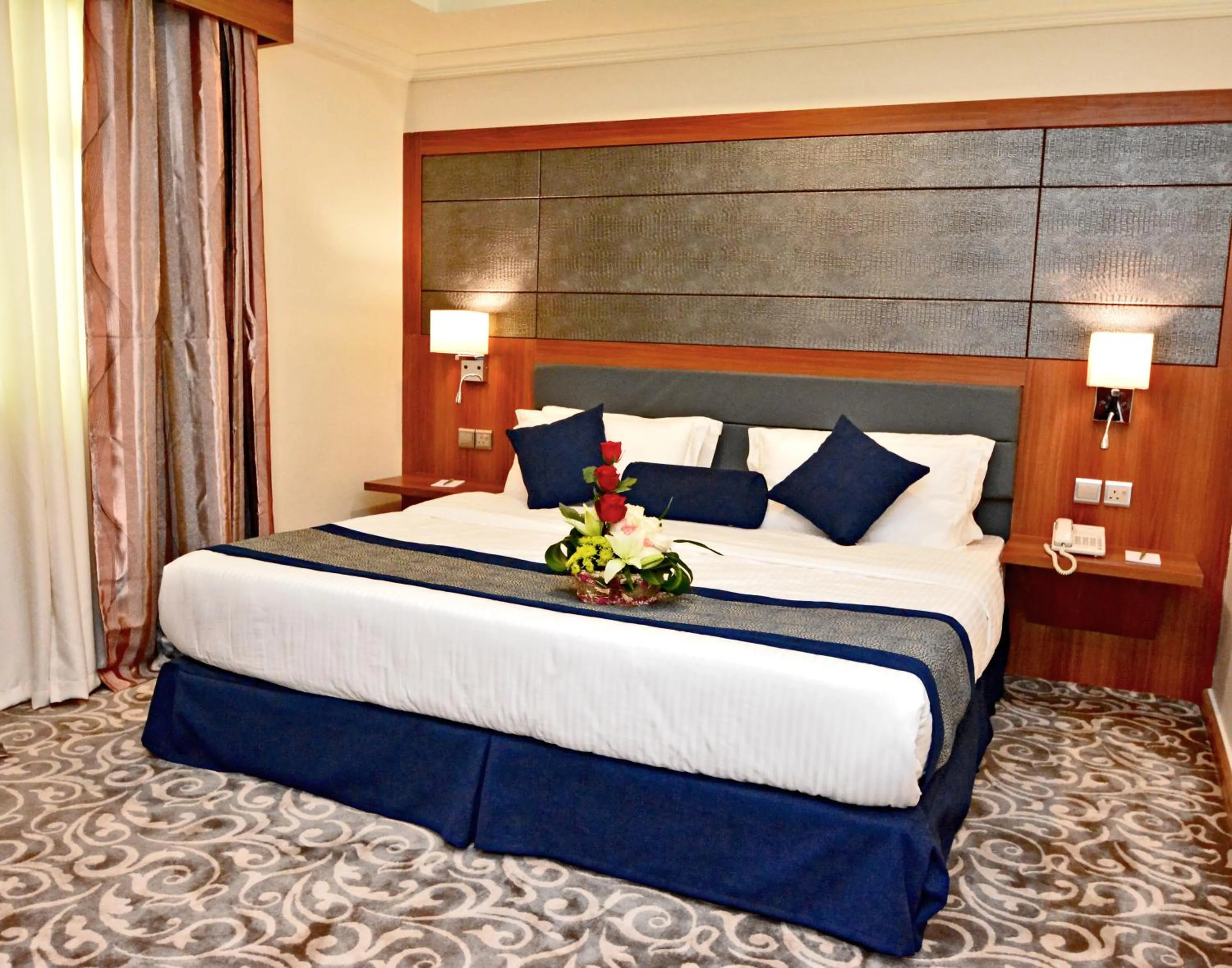 Bed in Grandeur East فخامة الشرق للشقق المخدومة