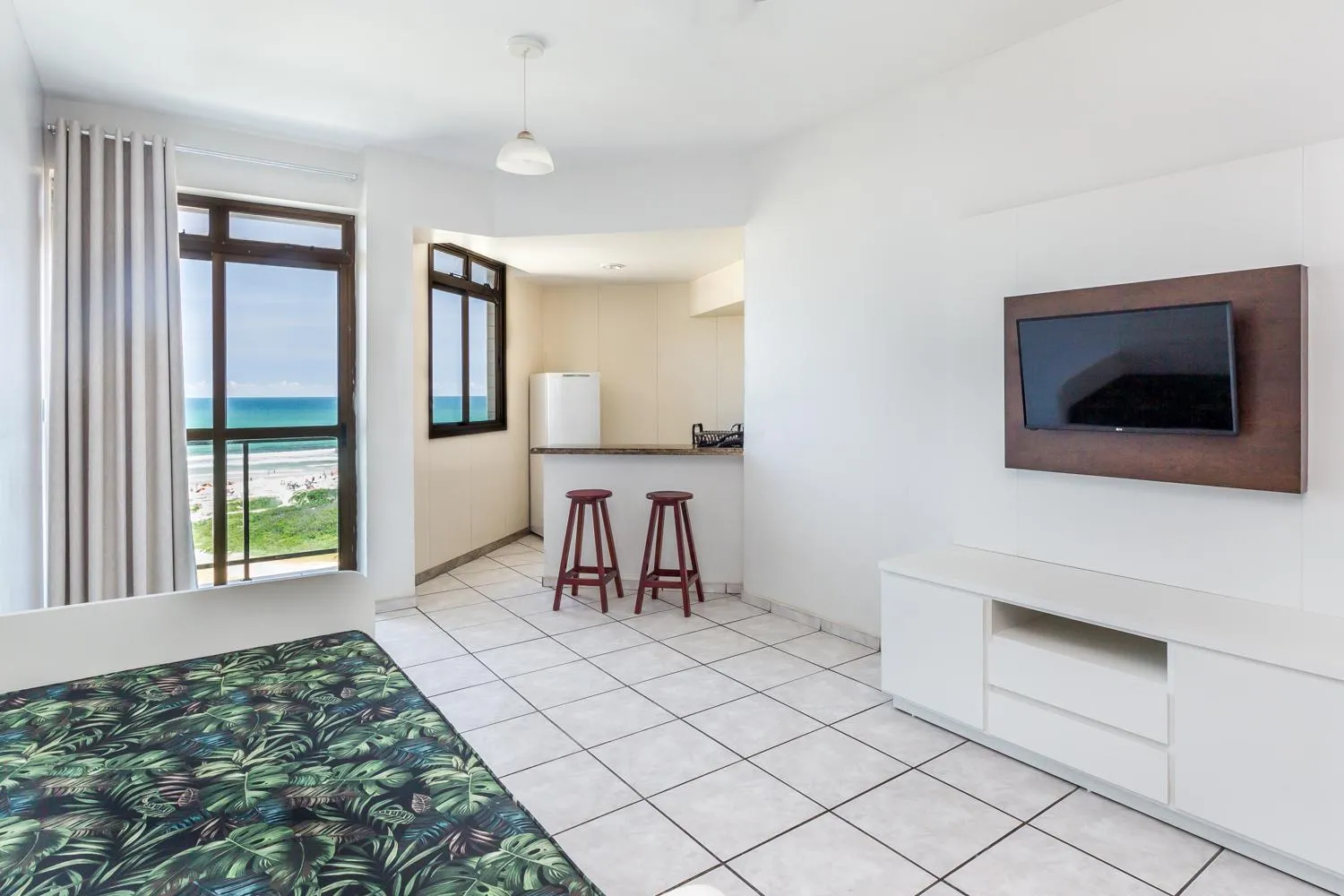 Communal lounge/ TV room in Apart Hotel Porto Príncipe