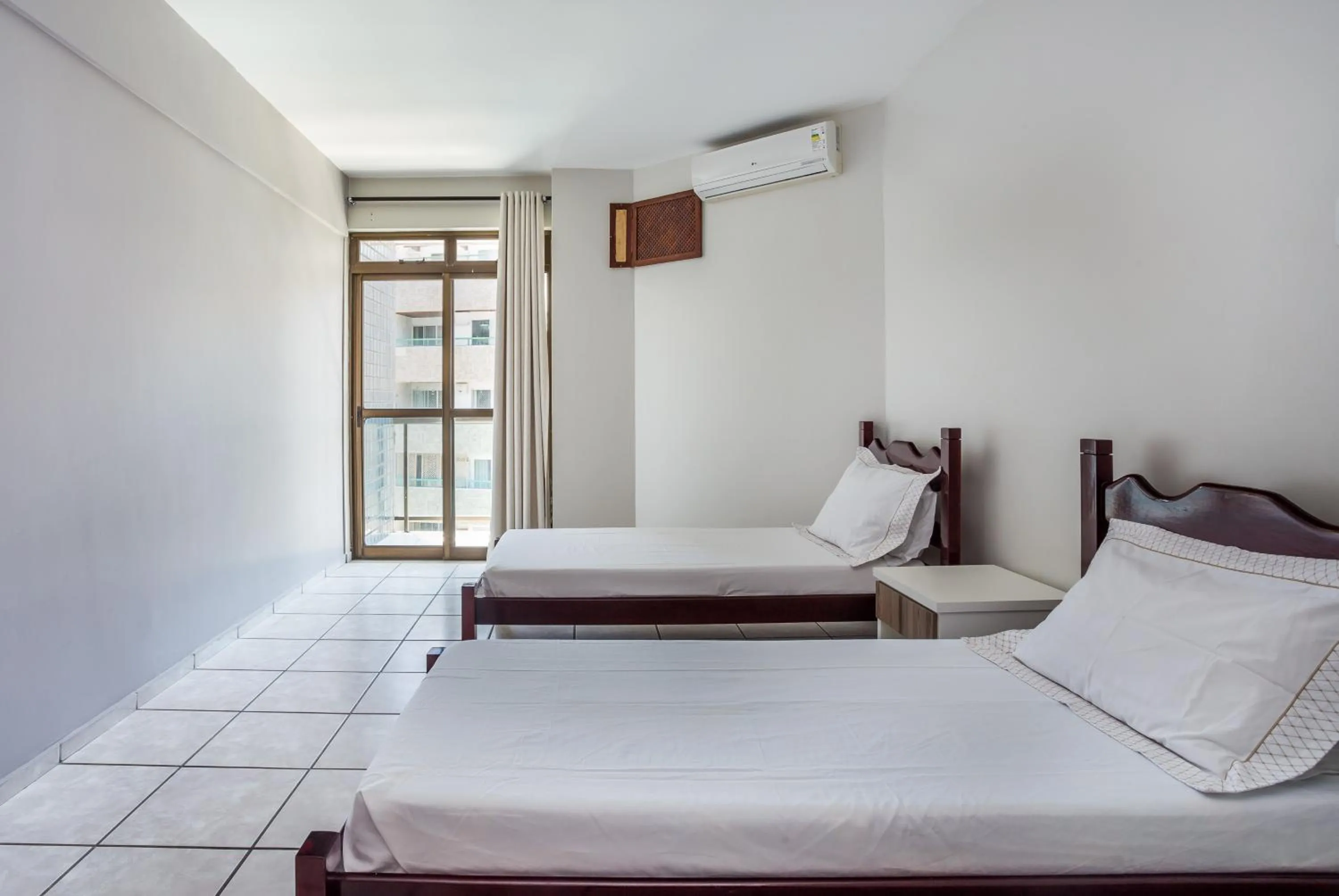 Bed in Apart Hotel Porto Príncipe