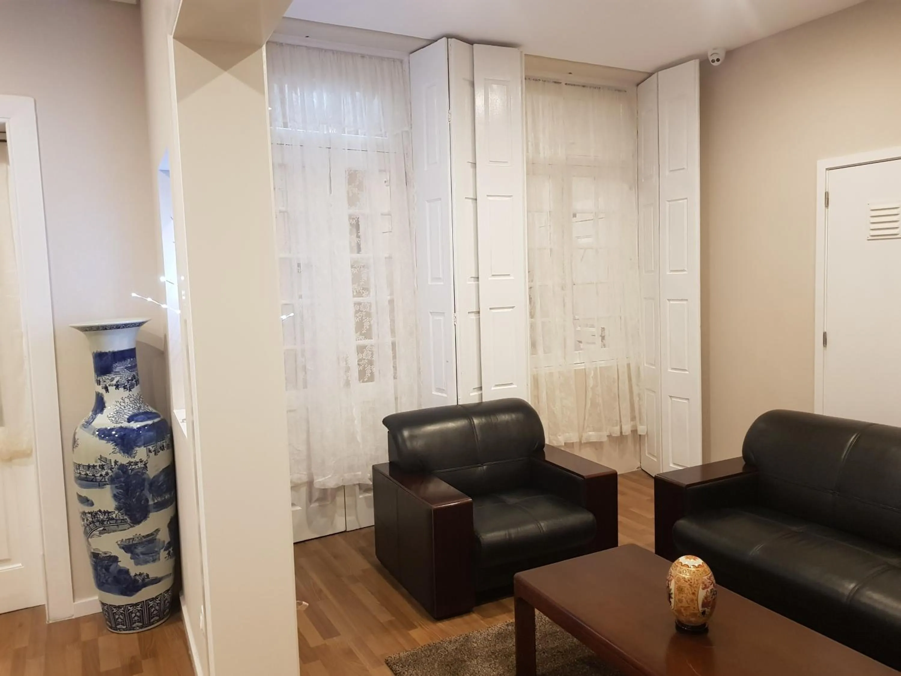 Communal lounge/ TV room in HaoBo Porto Center