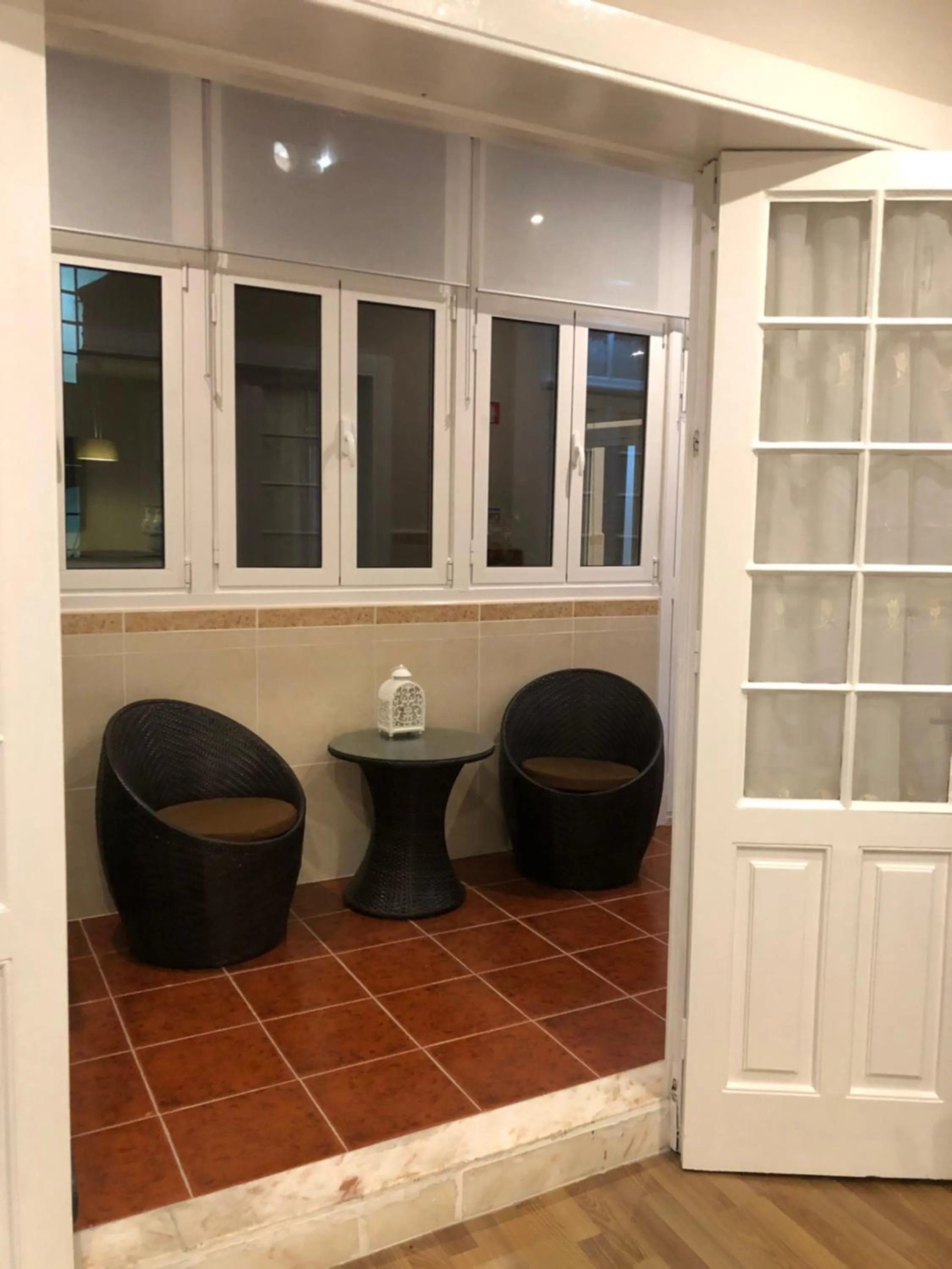 Communal lounge/ TV room in HaoBo Porto Center