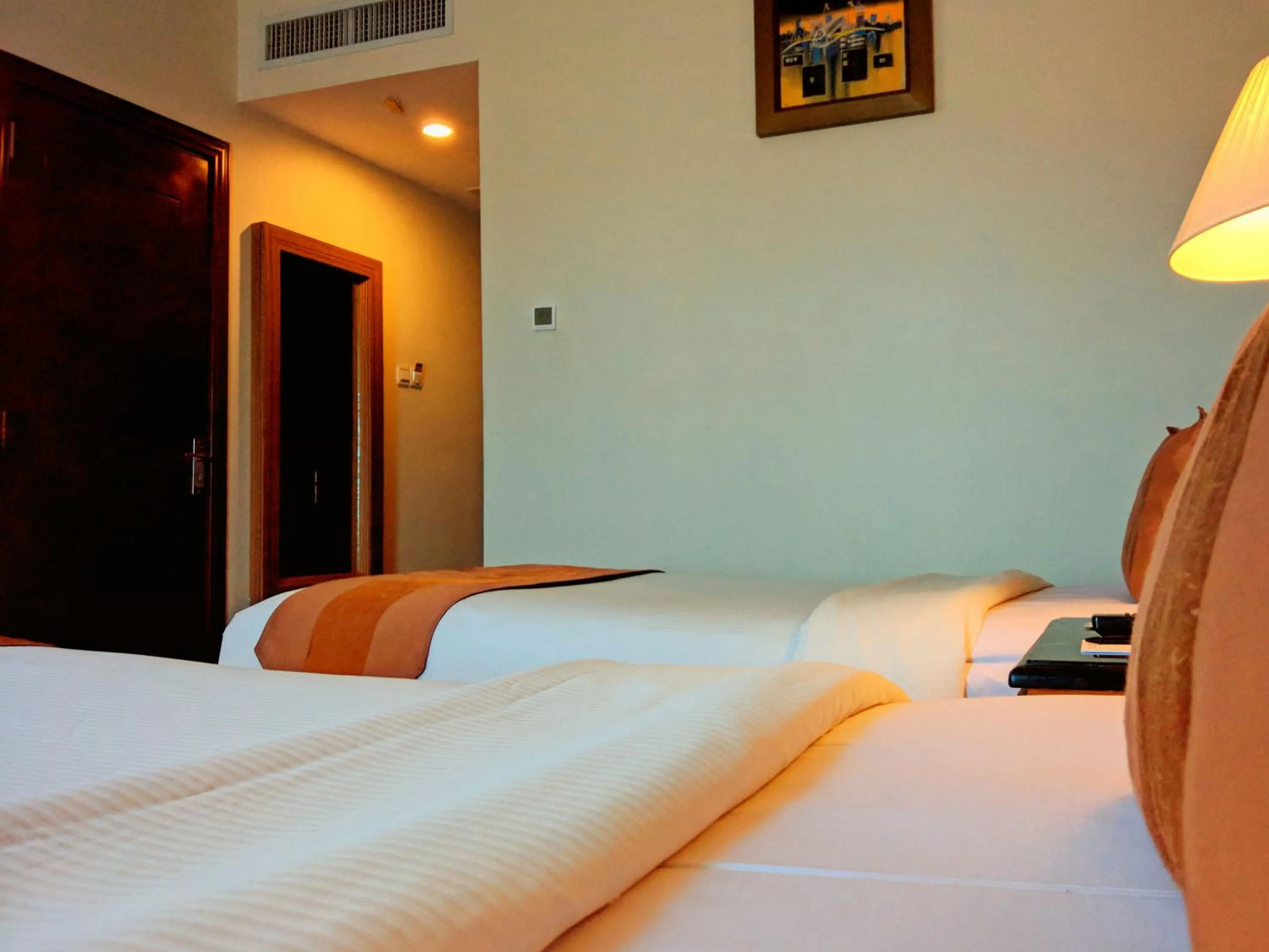 Bed in Grand Rocky Hotel Bukittinggi