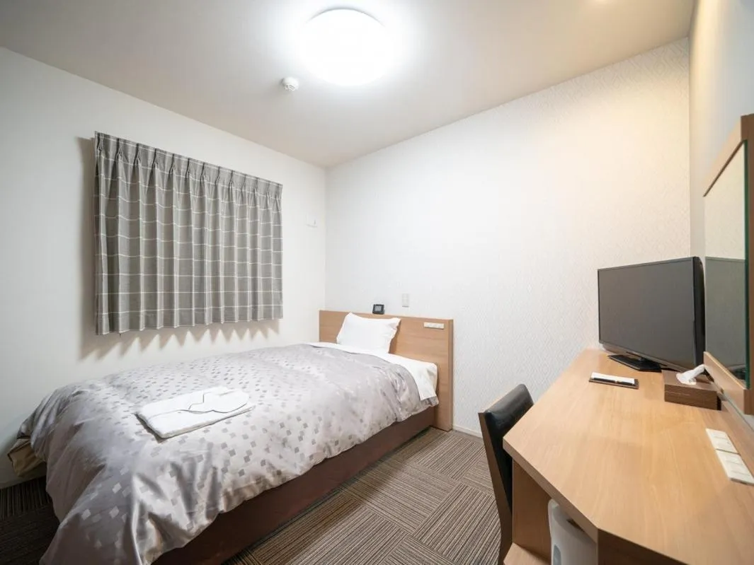 Bed in Amagasaki Plaza Hotel Hanshin Amagasaki