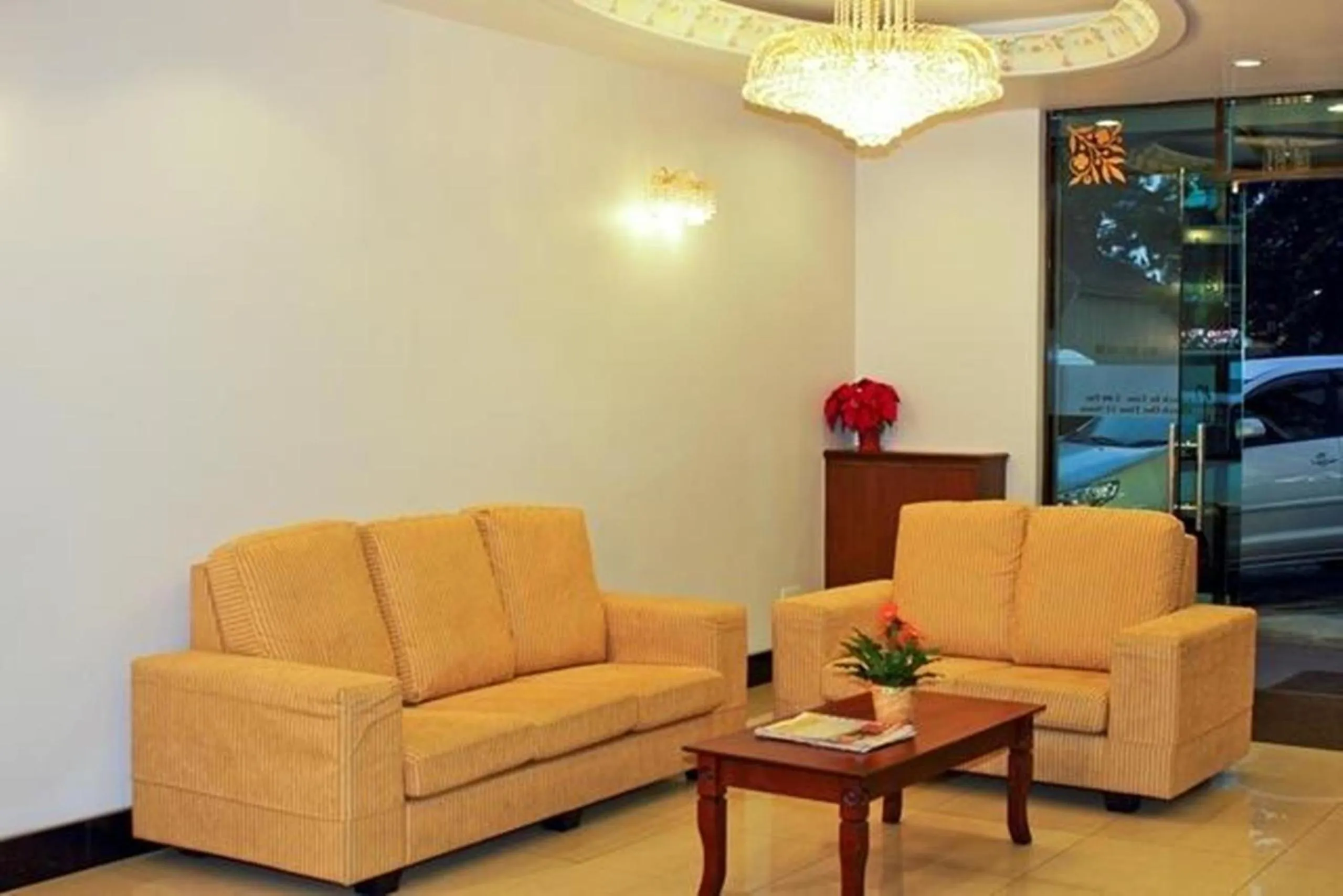 Communal lounge/ TV room in Jasmine Hotel