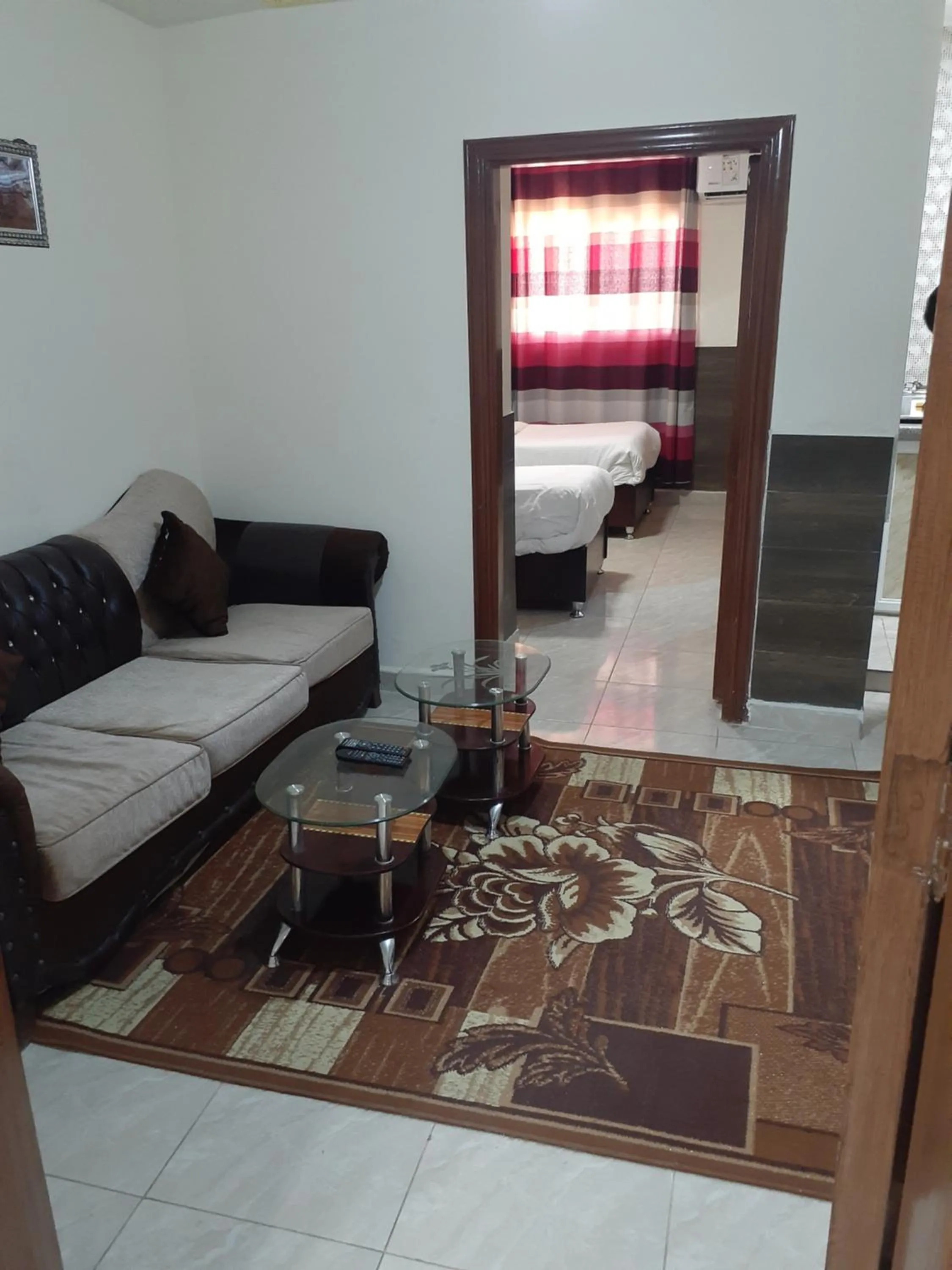 Seating area, Bed in Petra Visitors Hotel