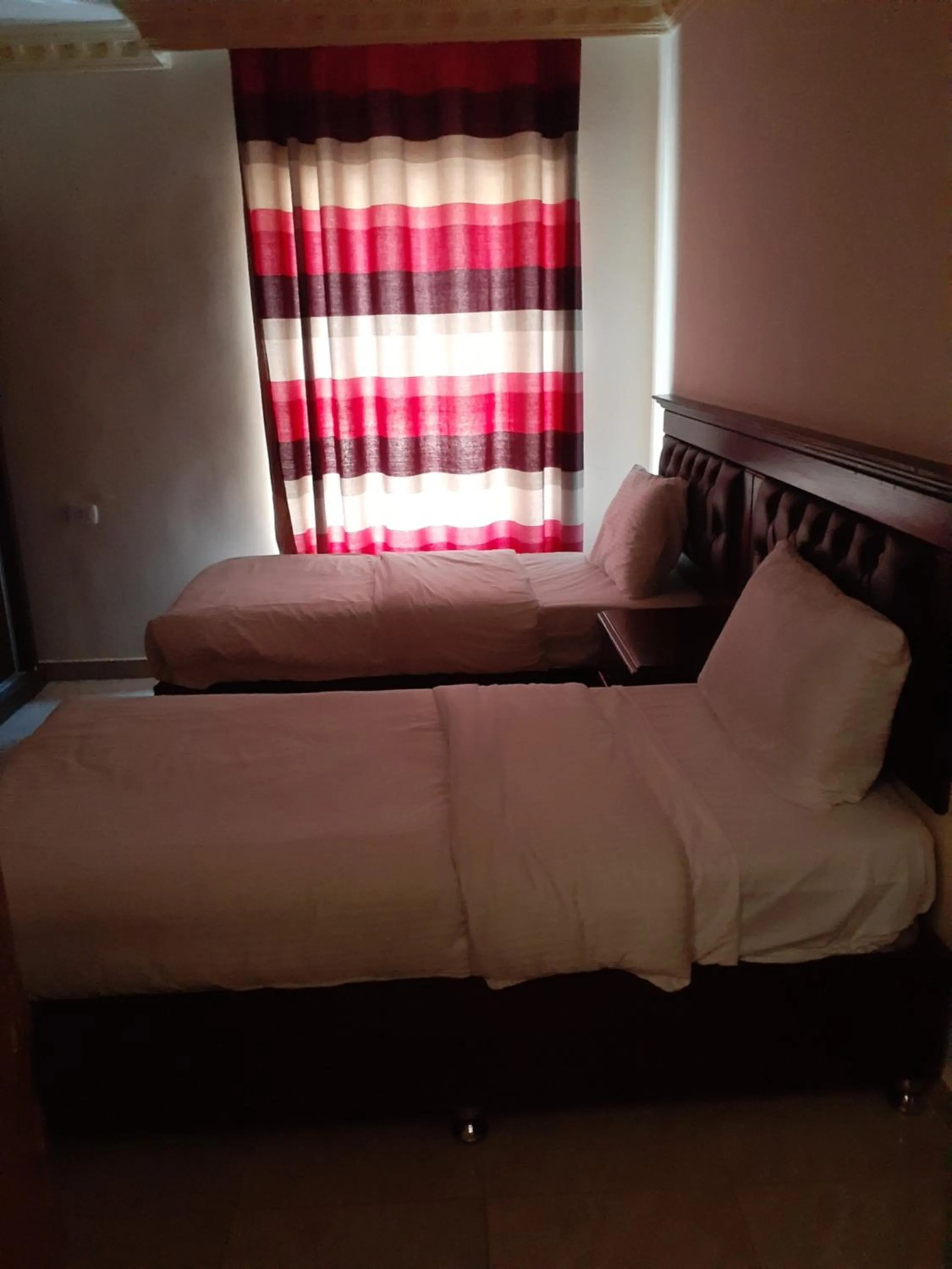 Photo of the whole room, Bed in Petra Visitors Hotel