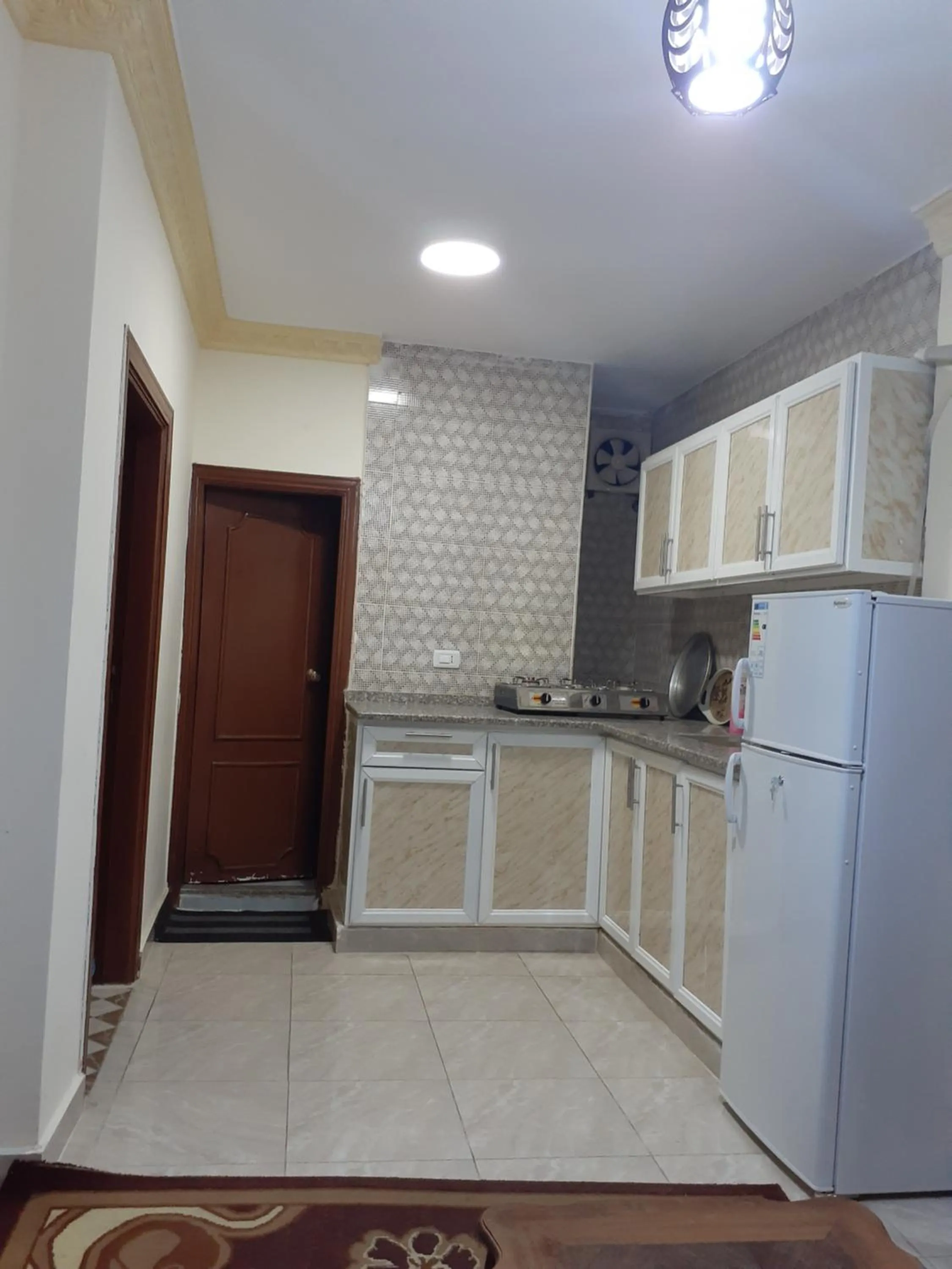 Kitchen or kitchenette in Petra Visitors Hotel