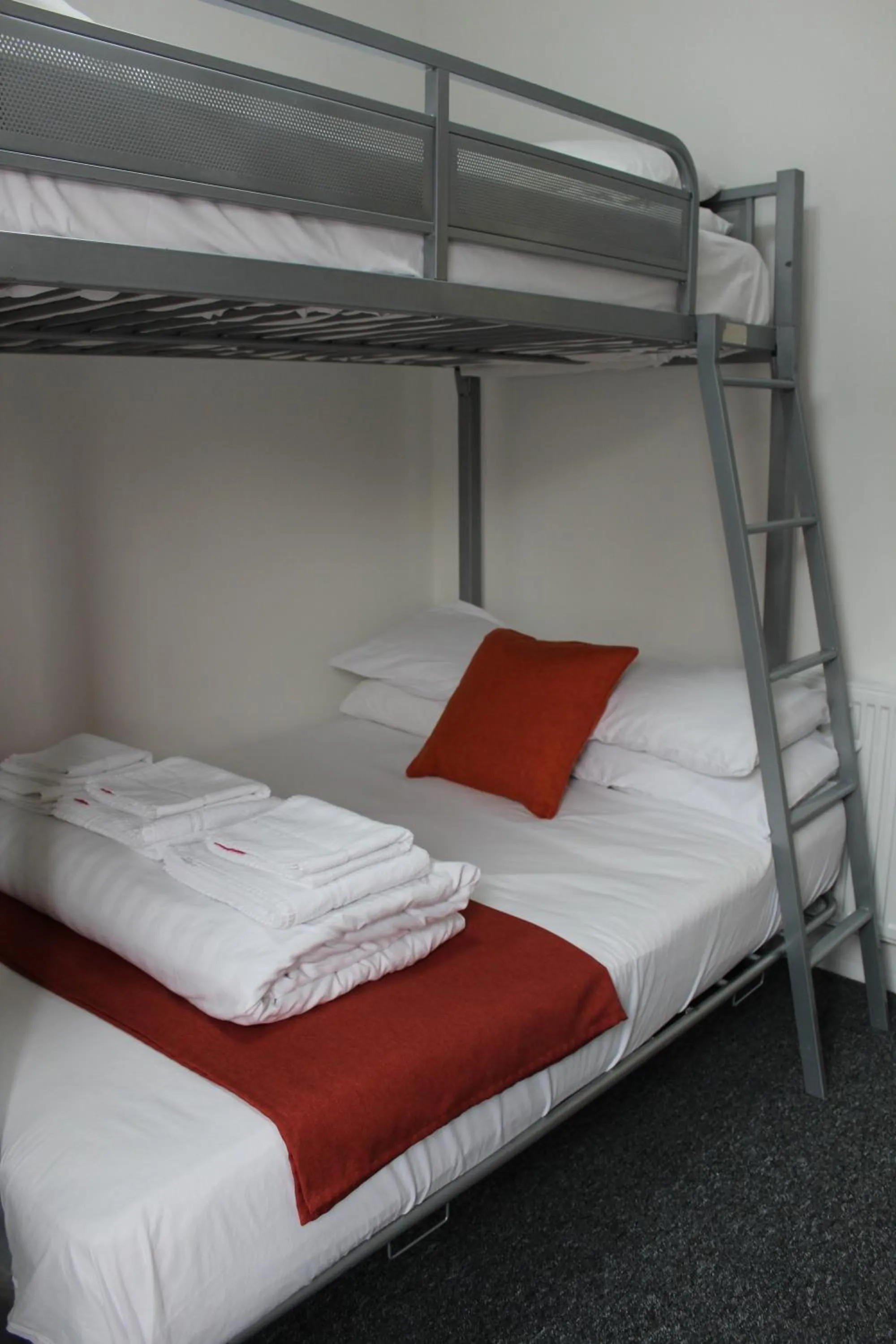 Photo of the whole room, Bed in Backpackers Blackpool Hotel & Suites