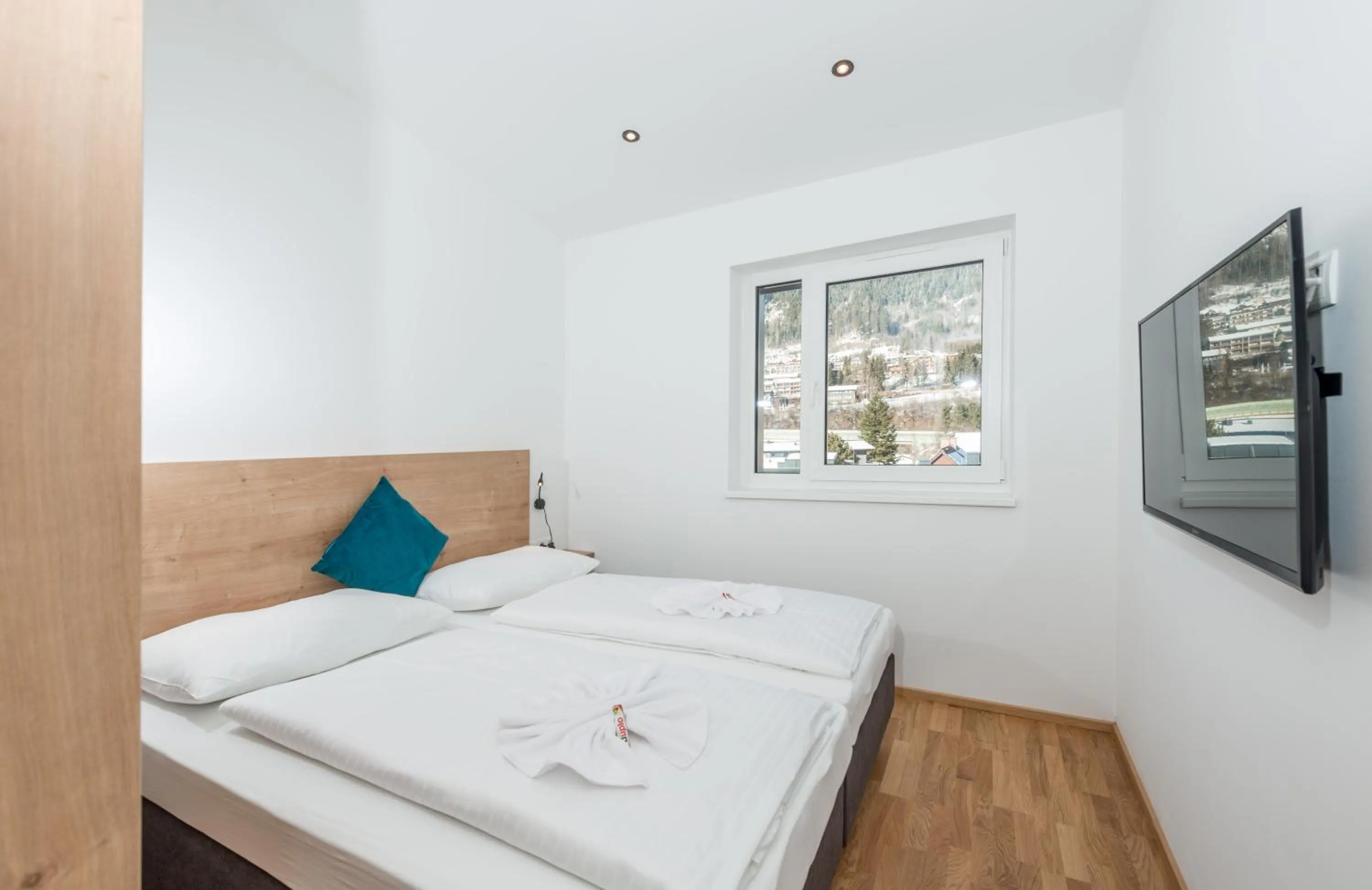 Bed in Deluxe Appartement Berglust