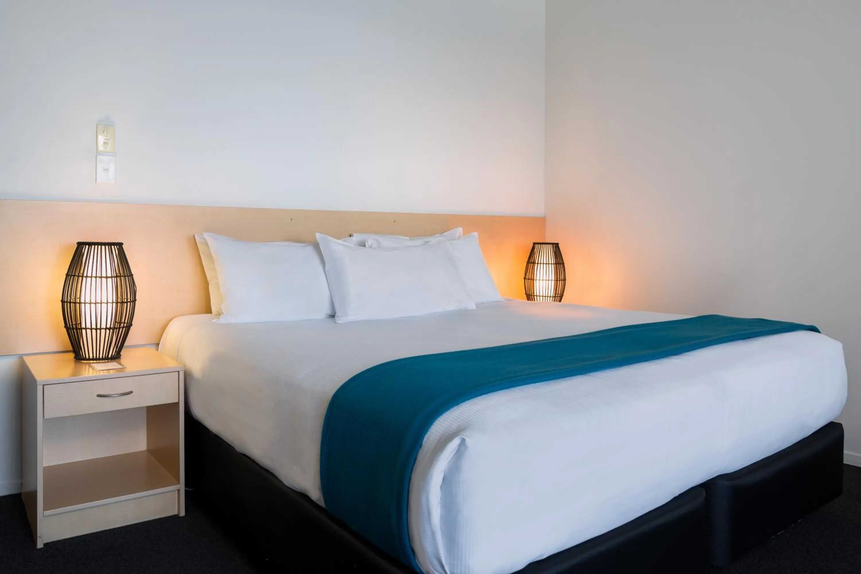 Bed in The Sands Hotel Hokianga