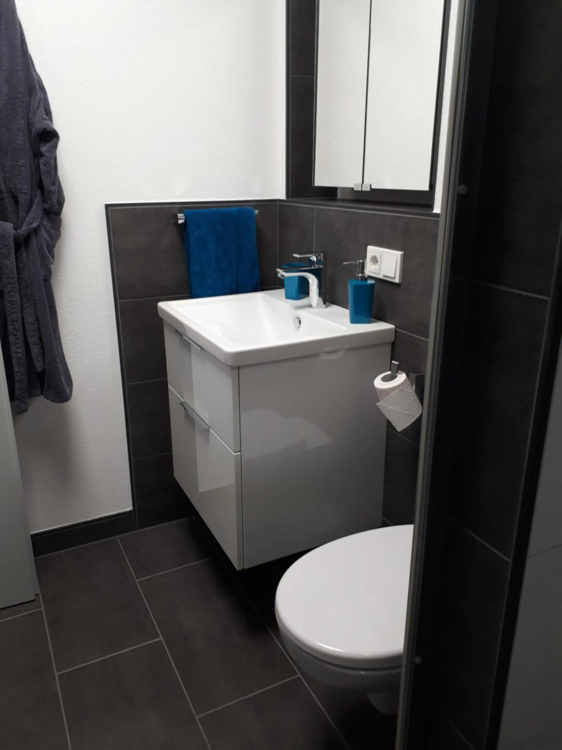 Toilet in Aparthotel-Stadtallendorf