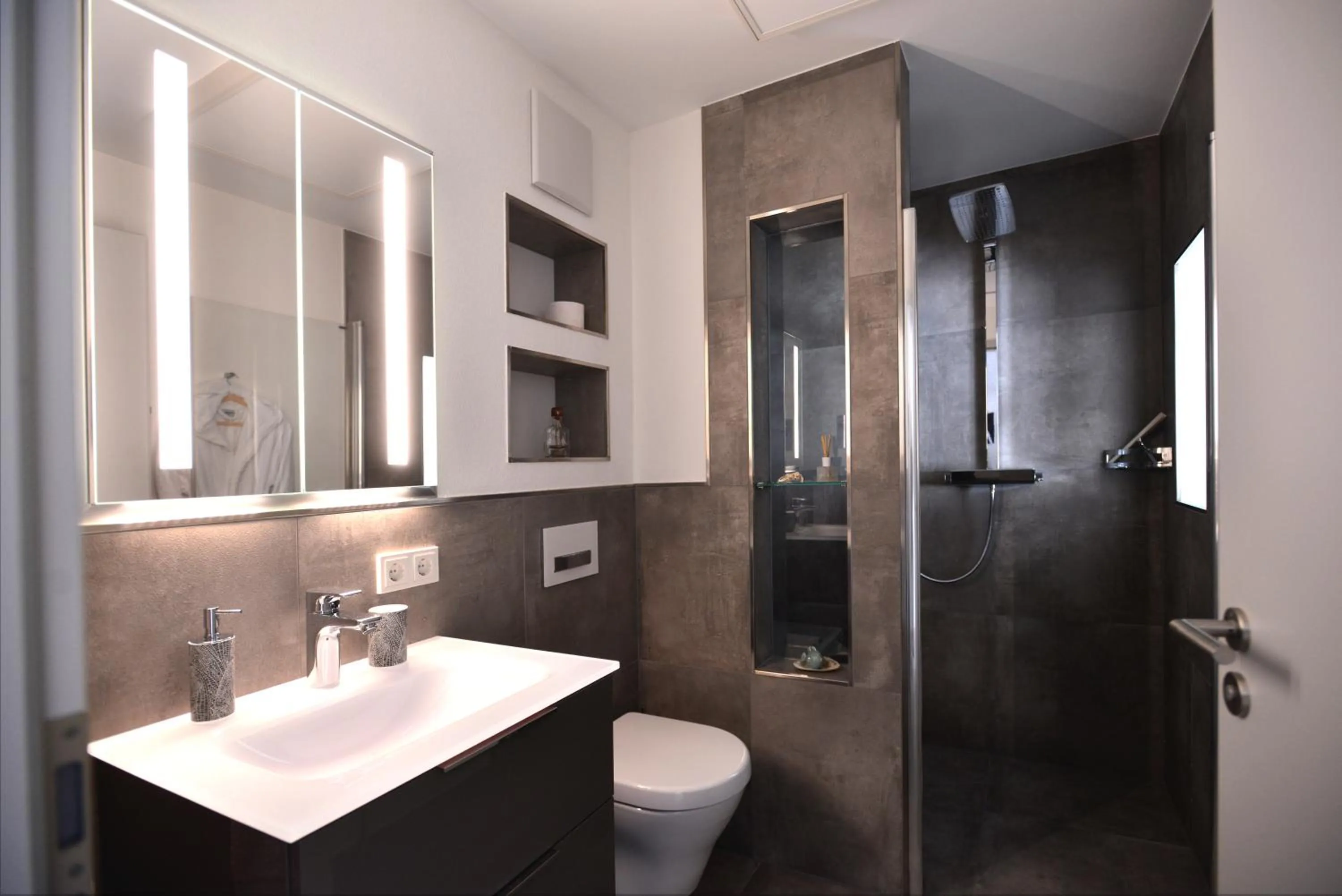 Shower in Aparthotel-Stadtallendorf