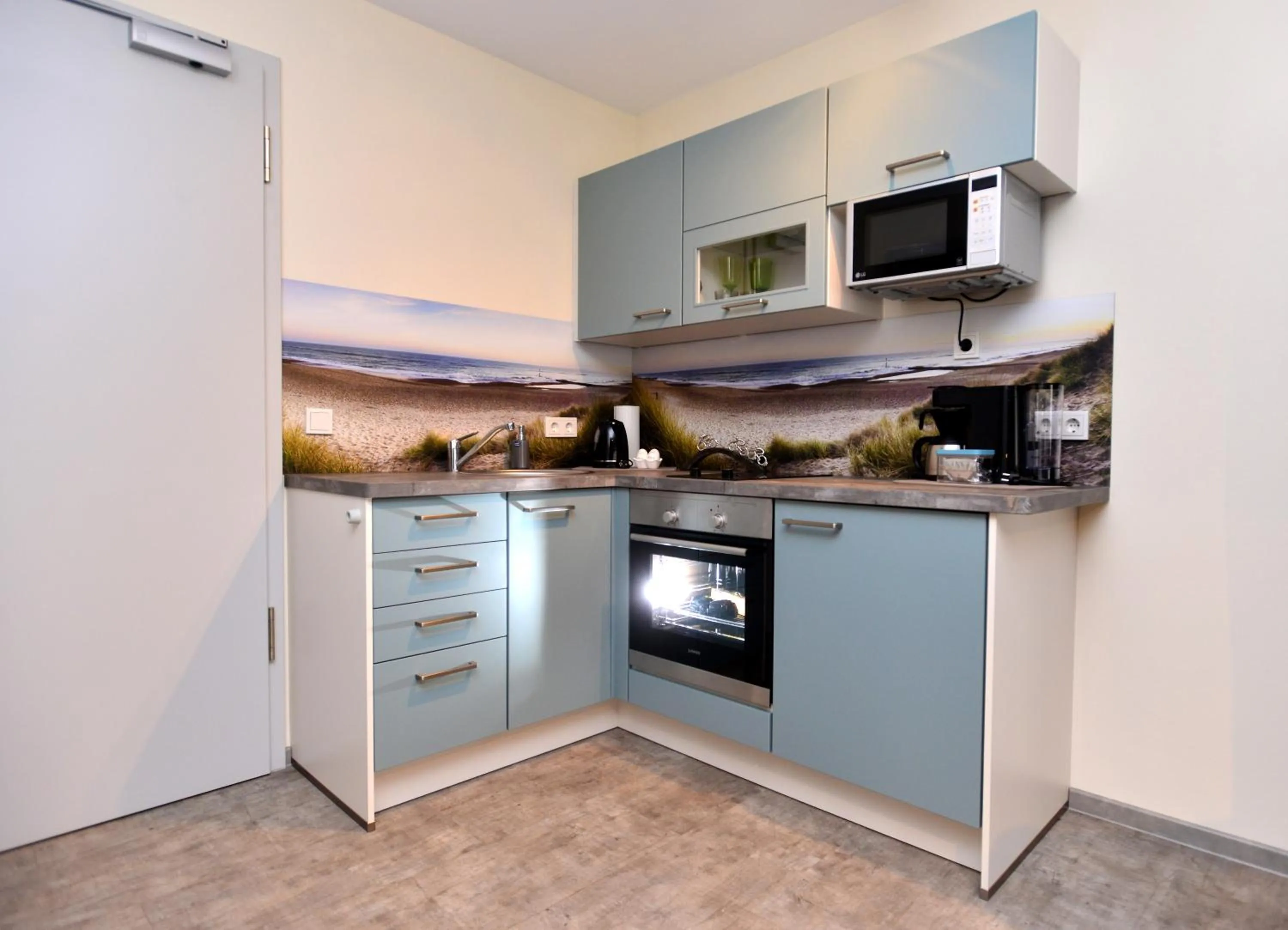 Kitchen or kitchenette in Aparthotel-Stadtallendorf
