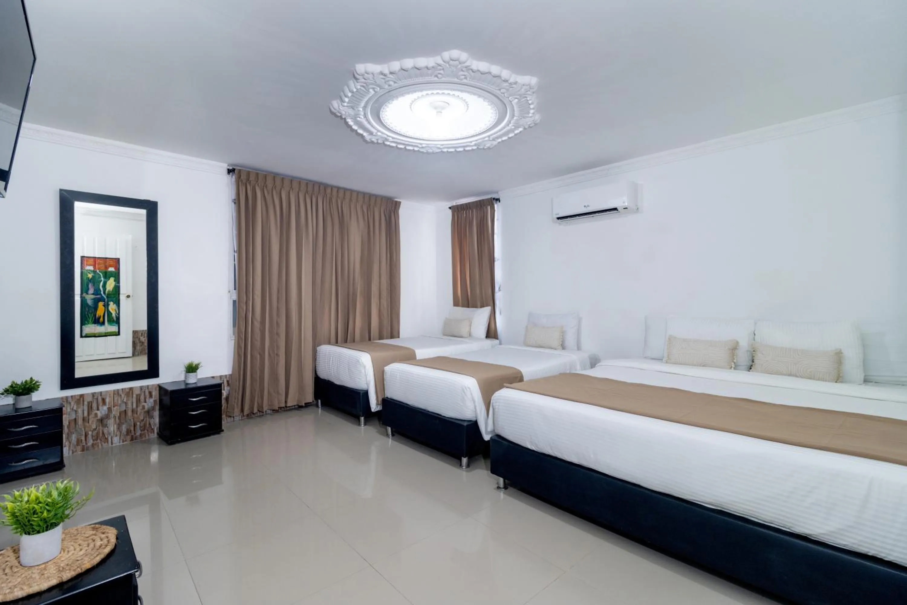 Photo of the whole room, Bed in Hotel Playa Salguero By GEH Suites