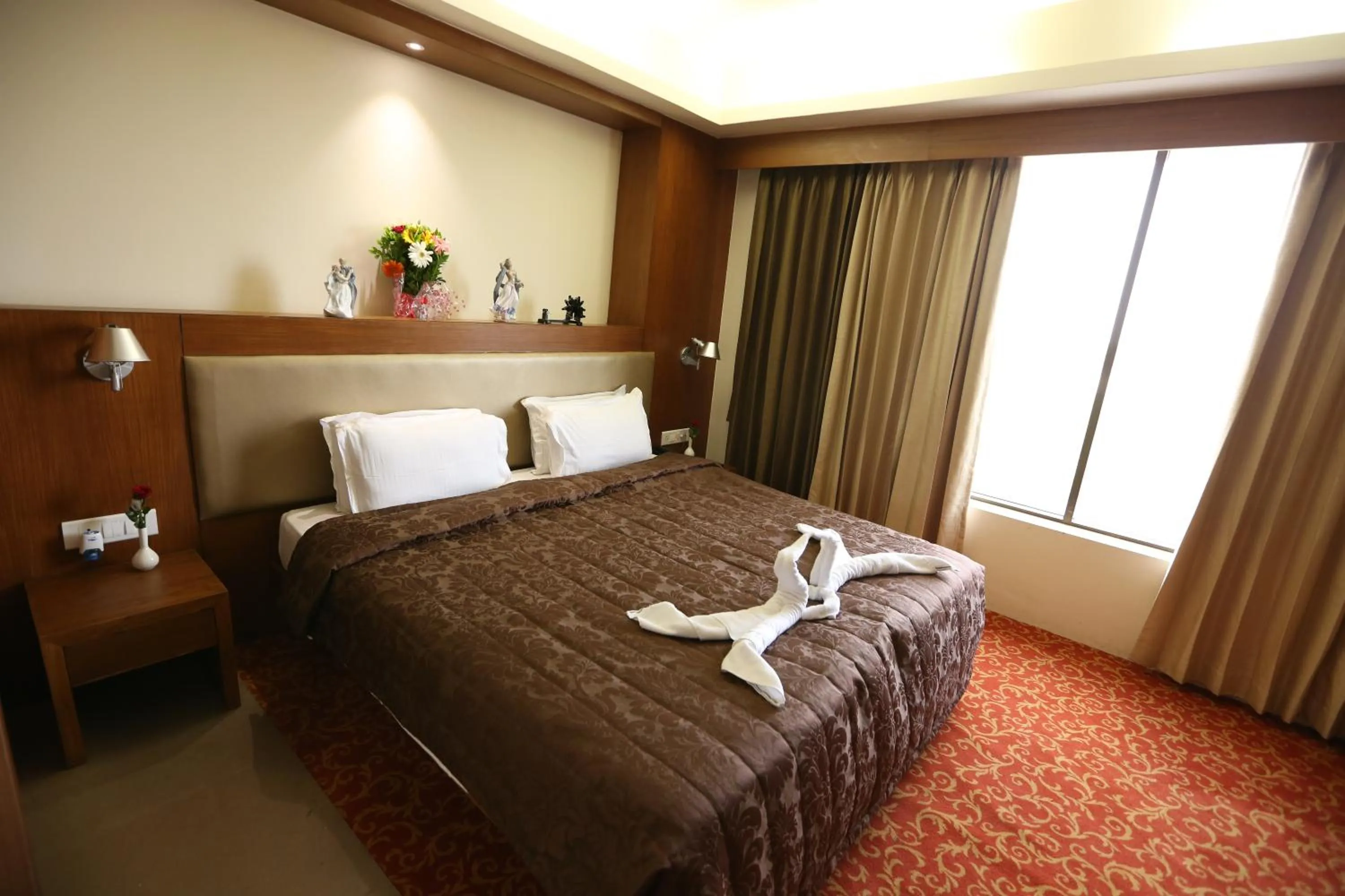 View (from property/room), Bed in SilverCloud Hotel and Banquets