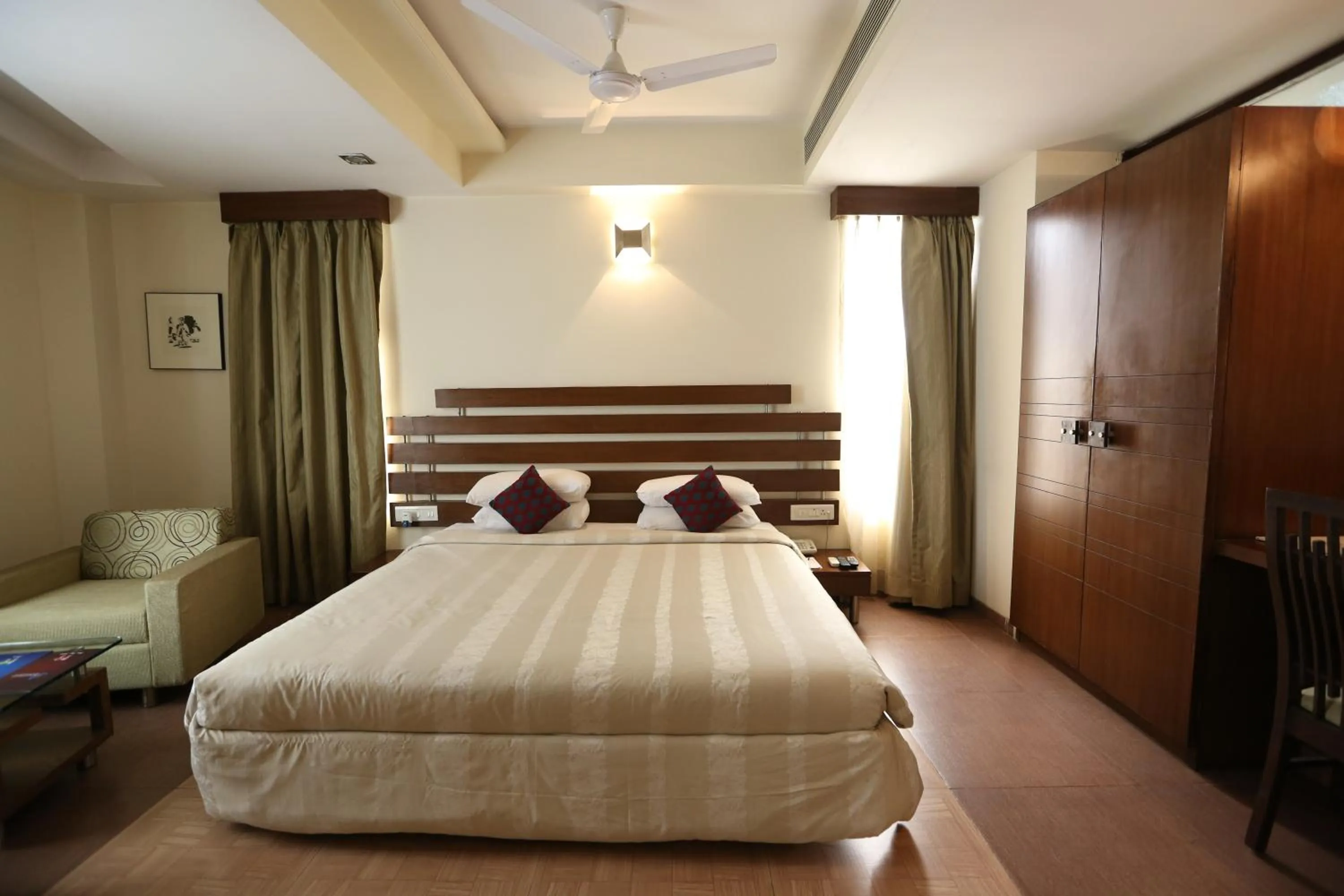 Bed in SilverCloud Hotel and Banquets