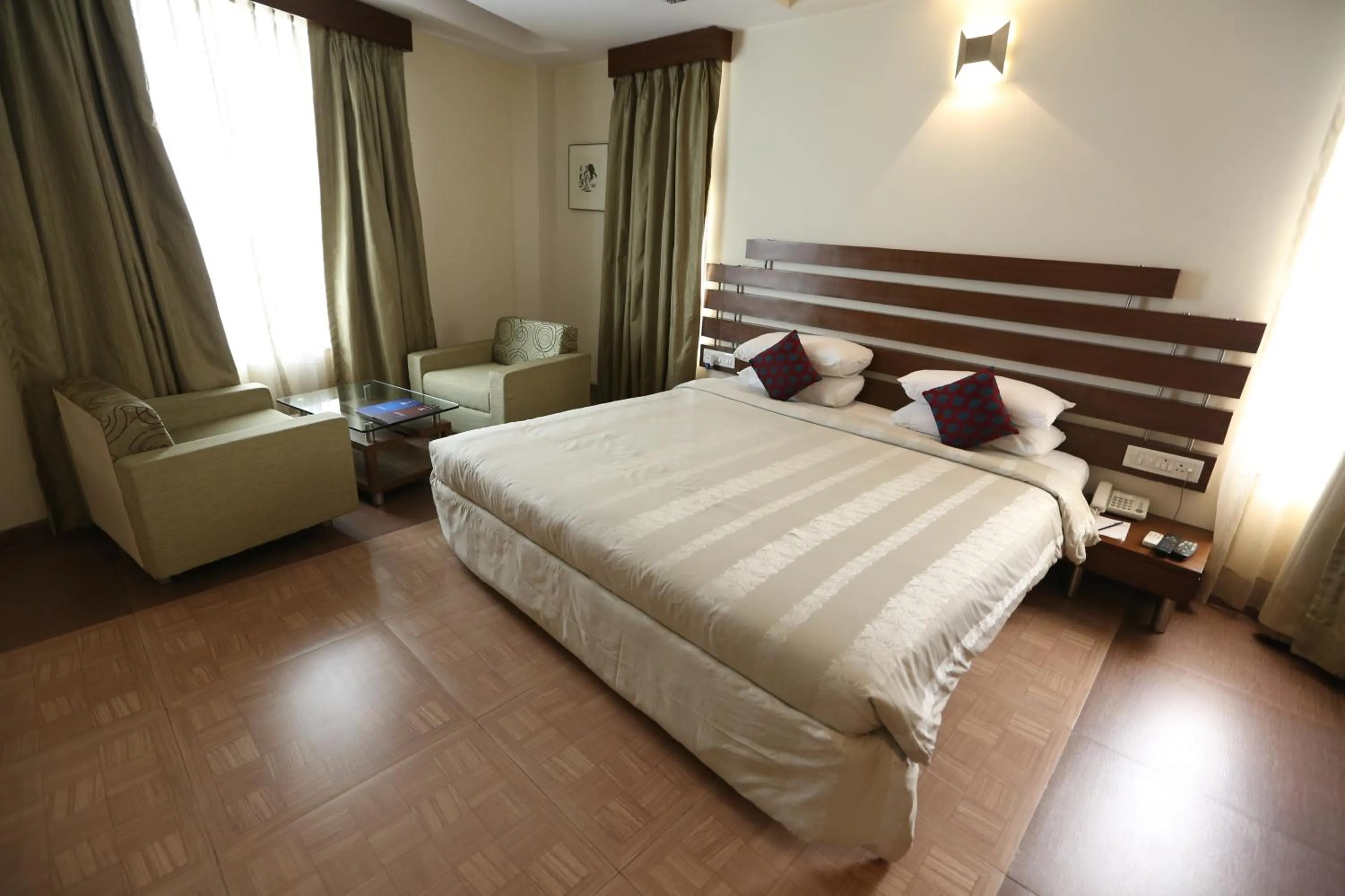 Bedroom, Bed in SilverCloud Hotel and Banquets