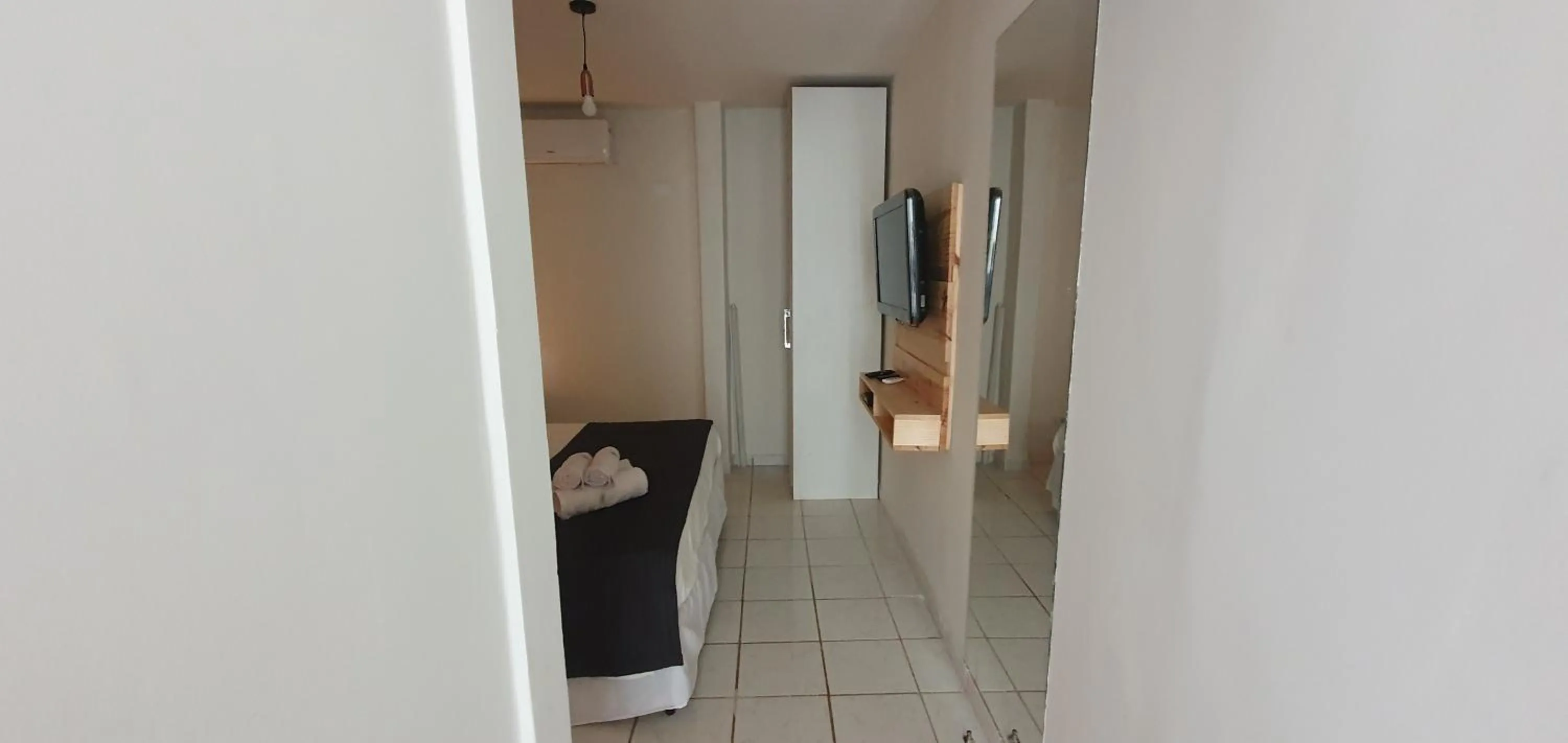 Bed in Pousada Aratu