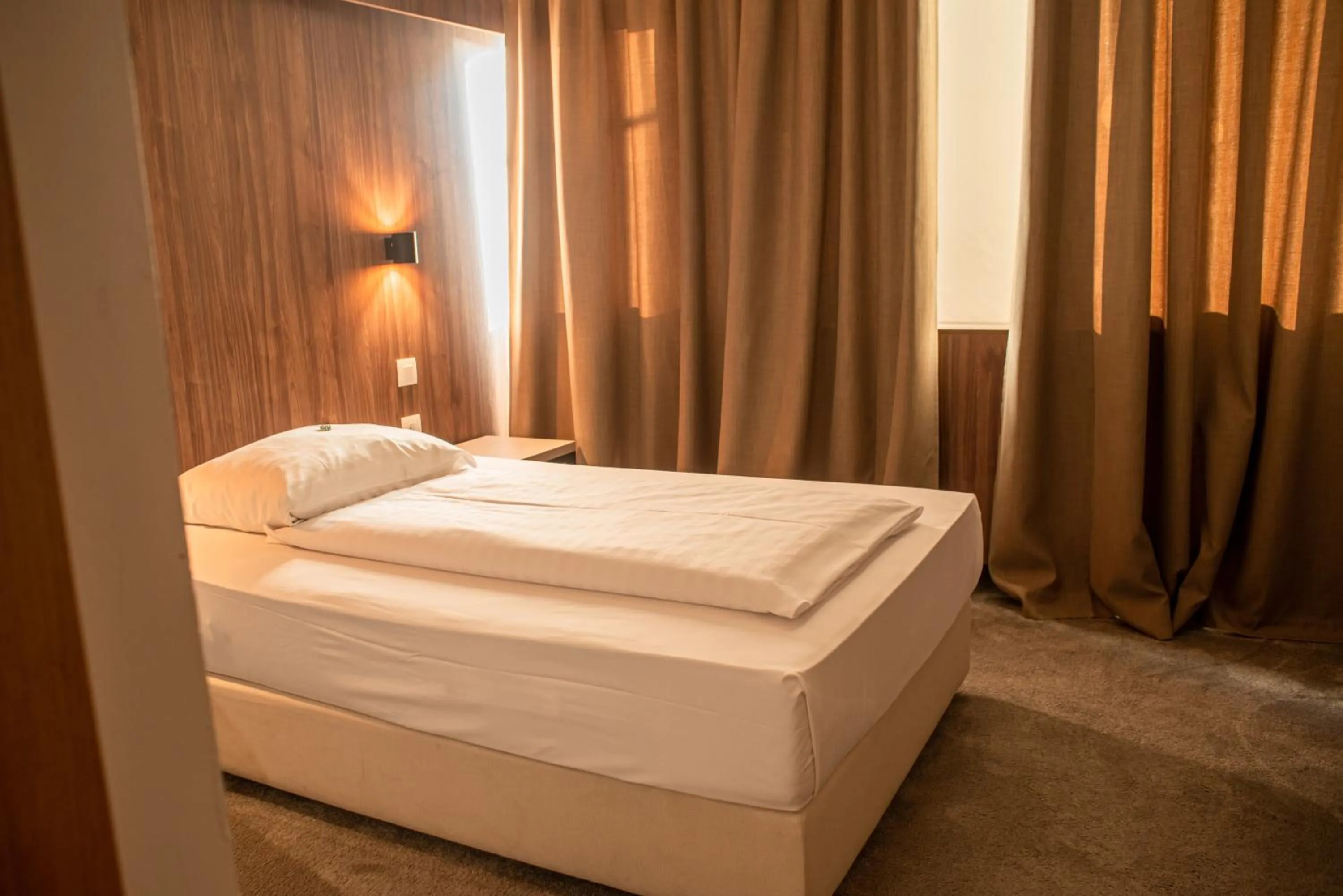 Bed in Hotel Sliško