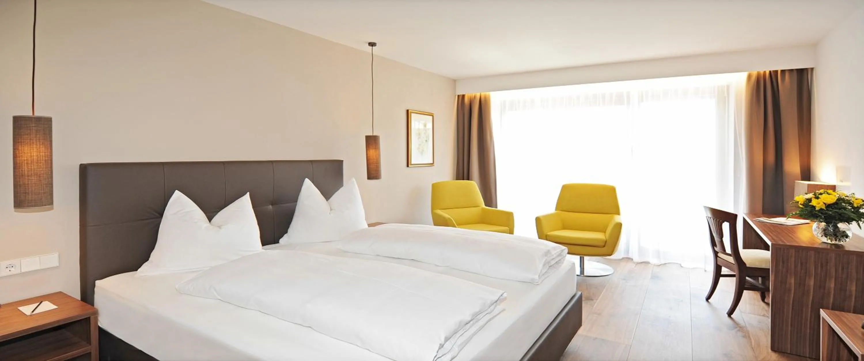 Bed in Hotel Vier Jahreszeiten