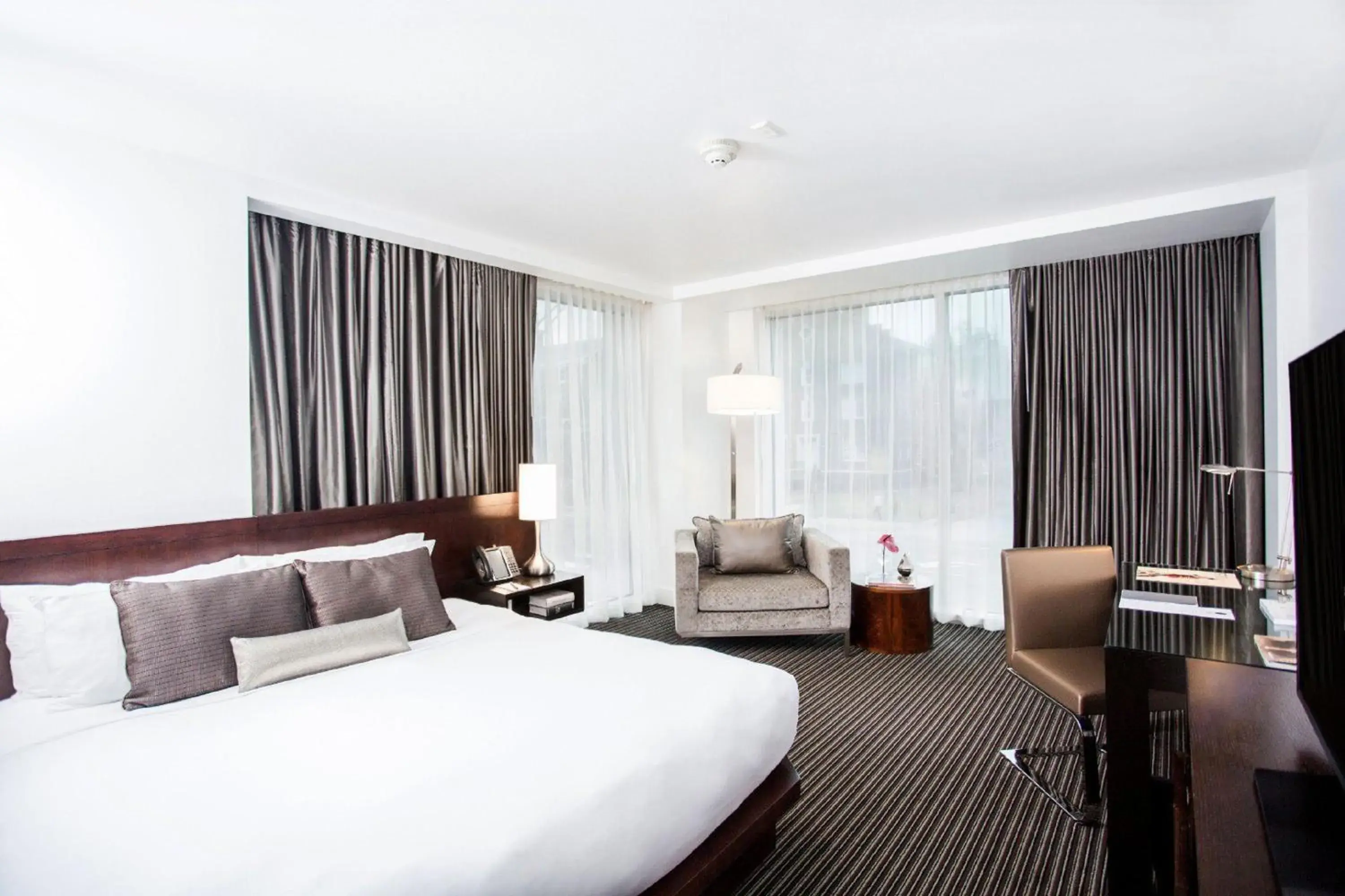 Premier King Room - Disability Access in Graduate by Hilton Dallas Premier King Room - Disability Access in Graduate by Hilton Dallas