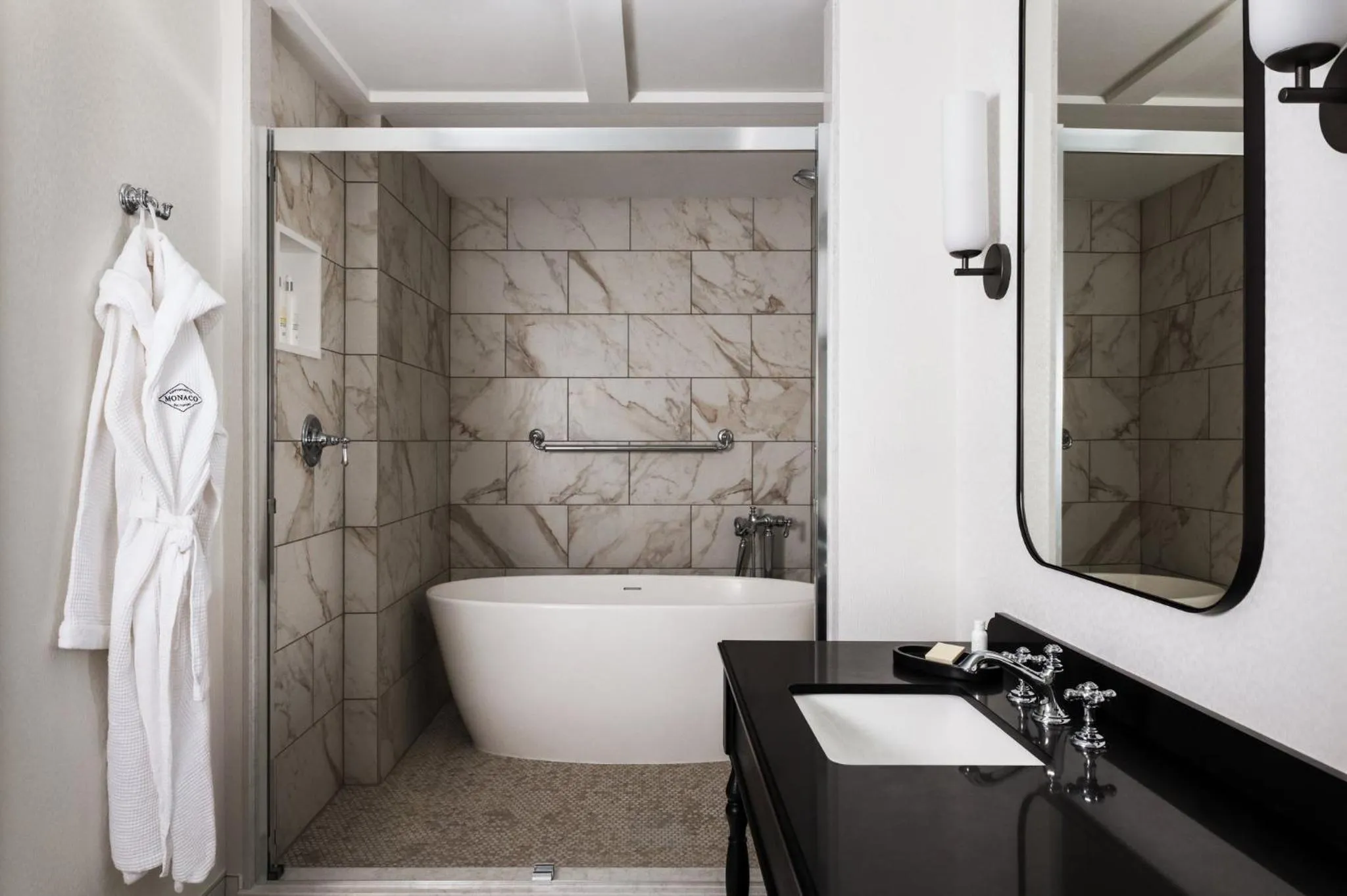 Bathroom in Kimpton Hotel Monaco Baltimore Inner Harbor by IHG