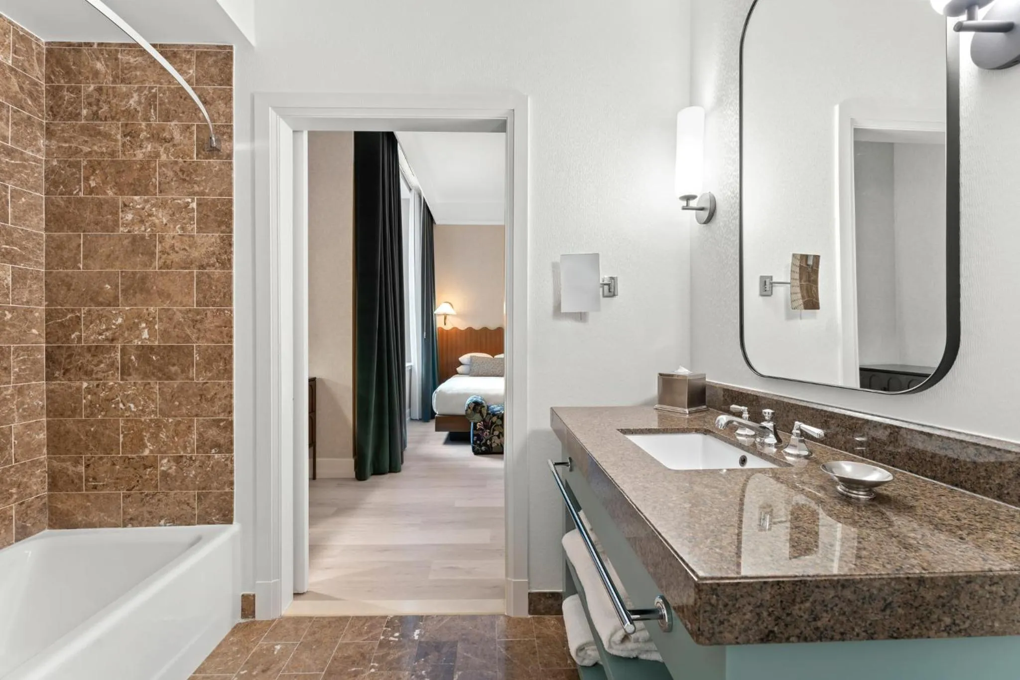 Bathroom in Kimpton Hotel Monaco Baltimore Inner Harbor by IHG