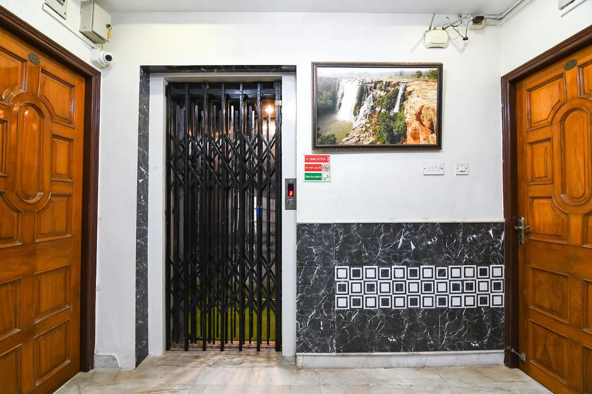 elevator in FabExpress Wild Orchid - 800m from Medica Superspecialty Hospital