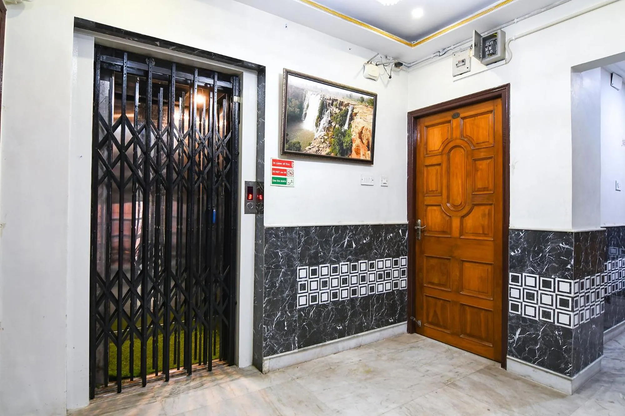 elevator in FabExpress Wild Orchid - 800m from Medica Superspecialty Hospital