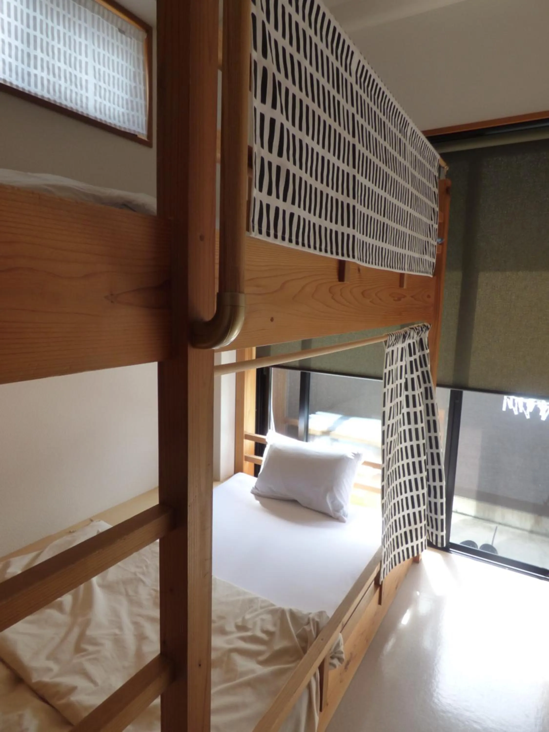 Bedroom, Bed in Guesthouse Hyakumanben Cross