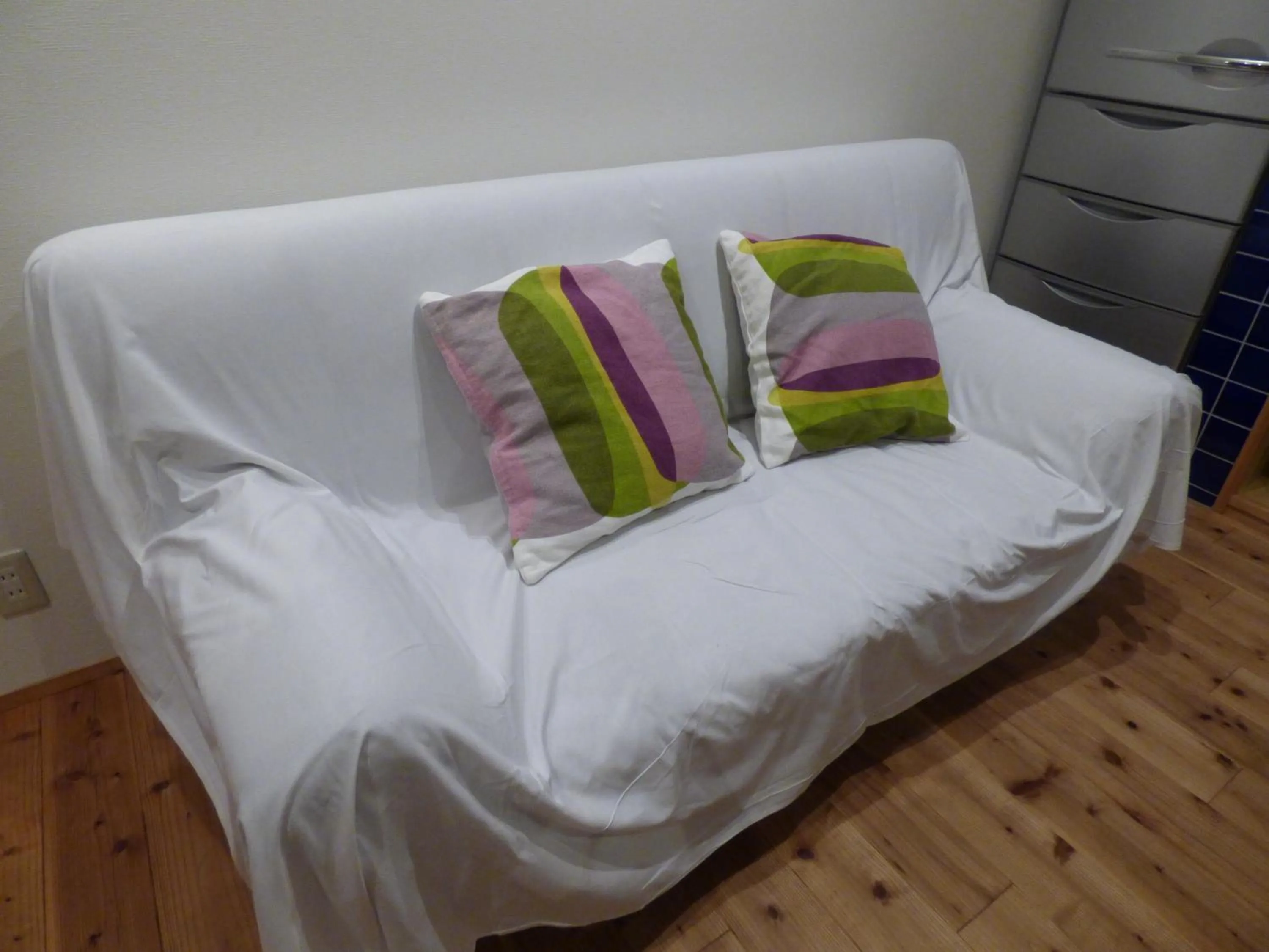 Communal lounge/ TV room, Bed in Guesthouse Hyakumanben Cross