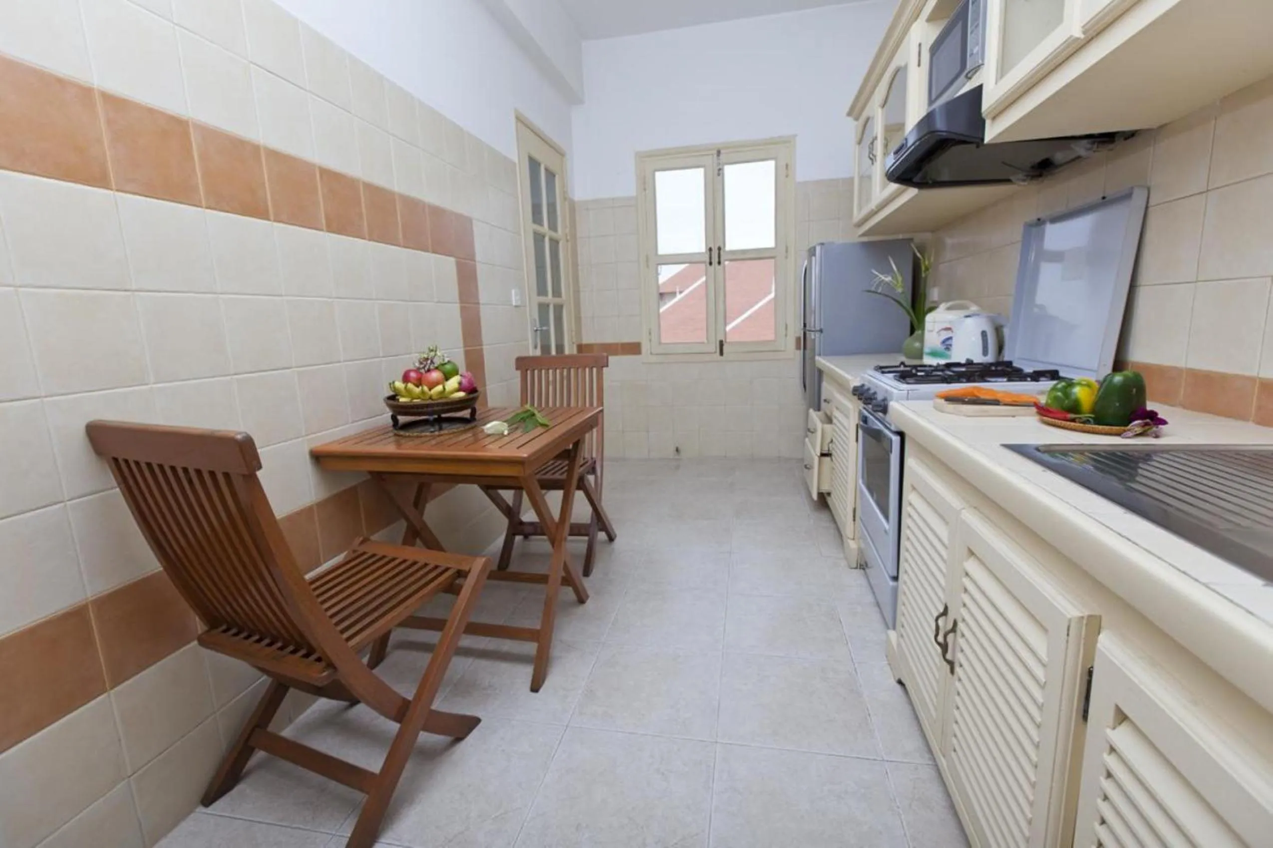 Kitchen or kitchenette in Grand Residence