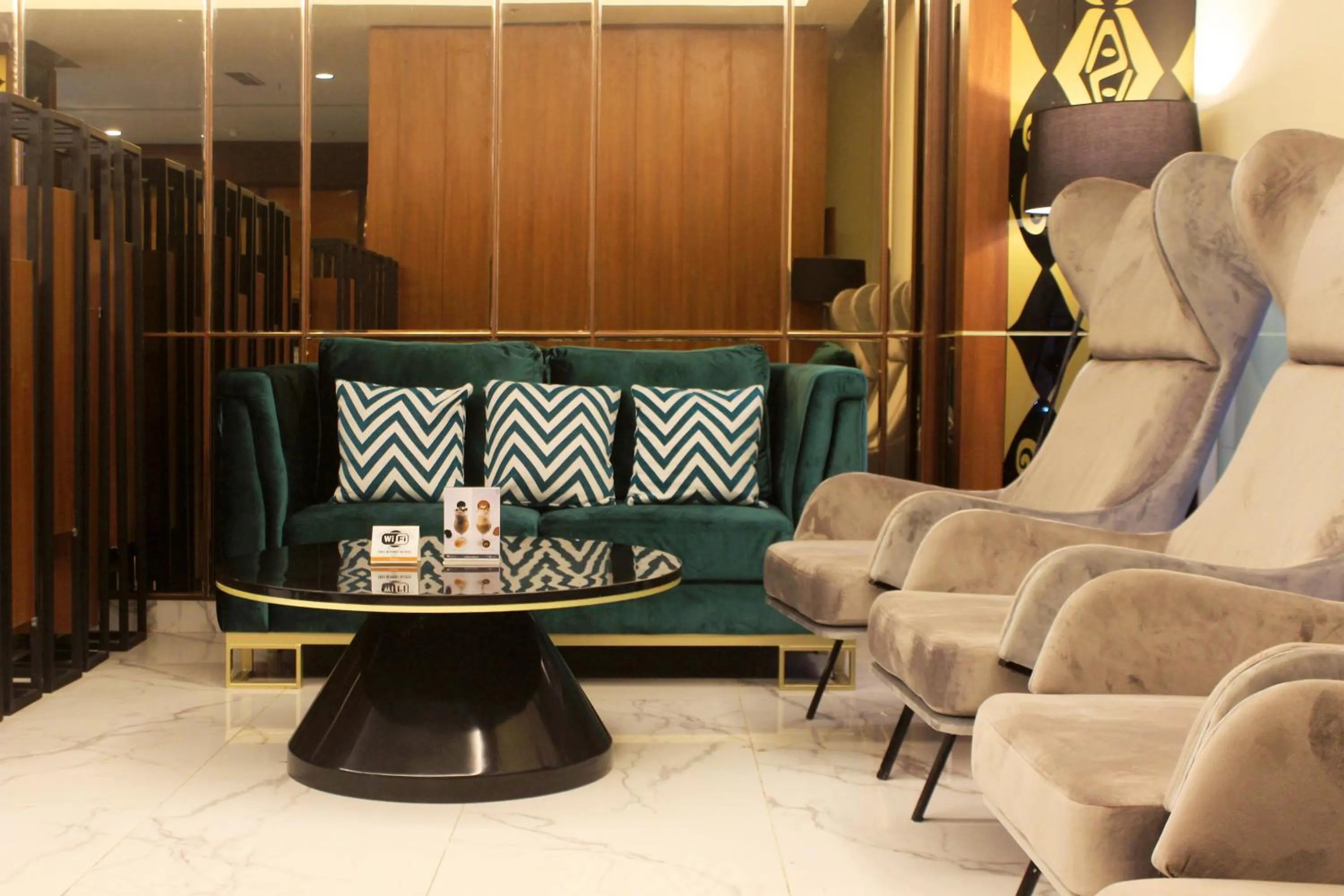 Communal lounge/ TV room in Swiss-Belexpress Jayapura