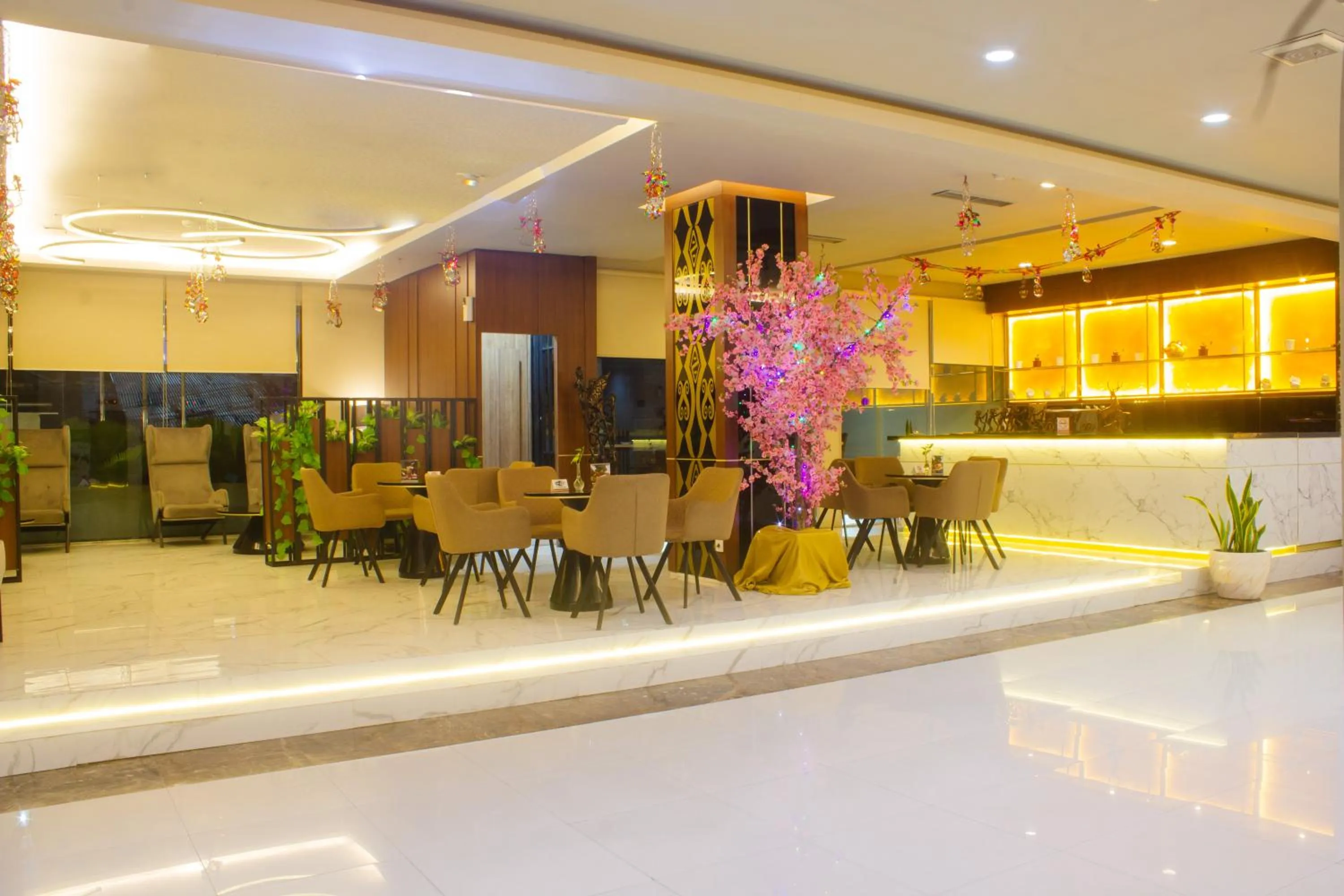 Communal lounge/ TV room in Swiss-Belexpress Jayapura