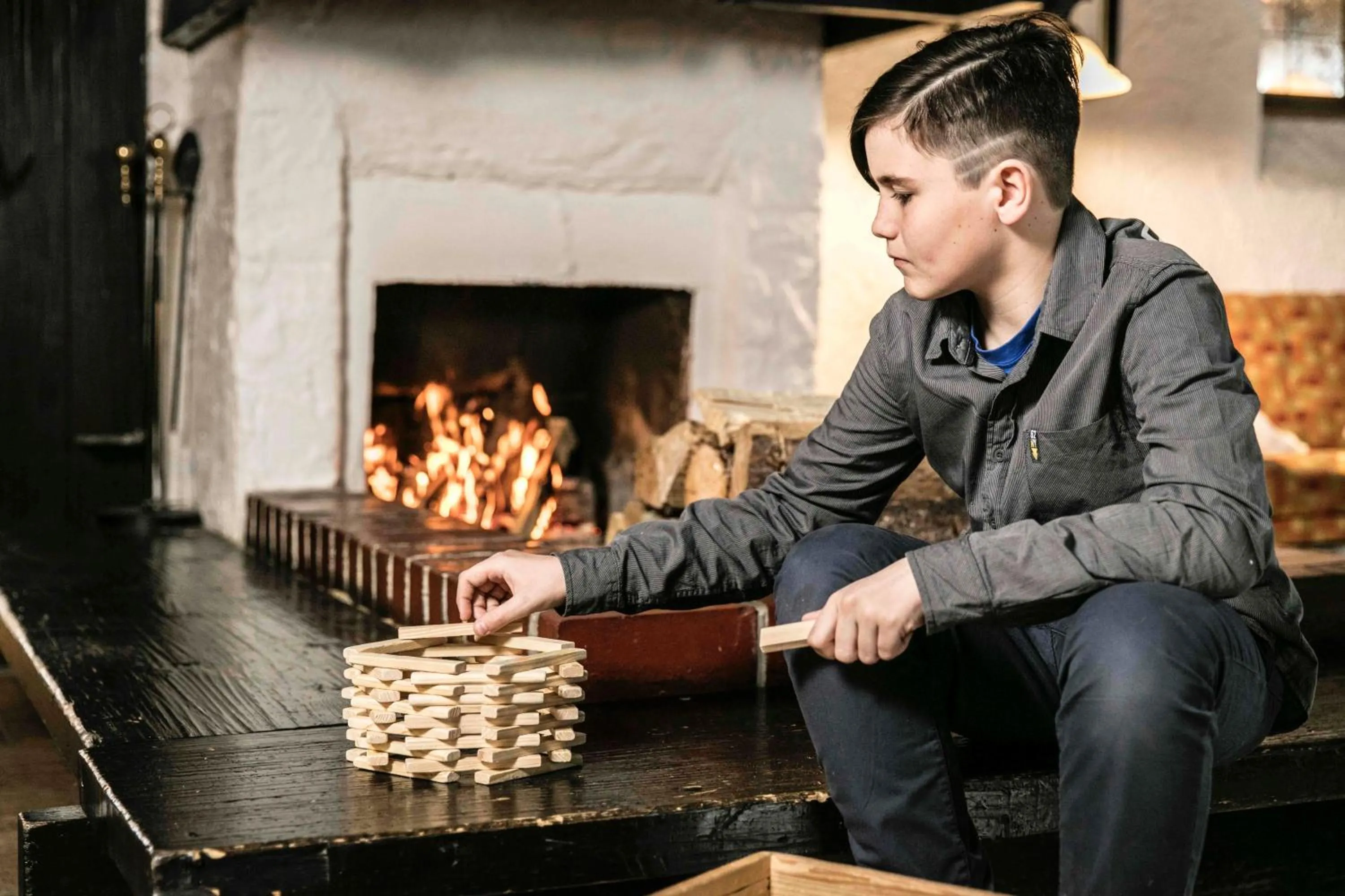 fireplace in Alpenlodge - Das Dorfhotel