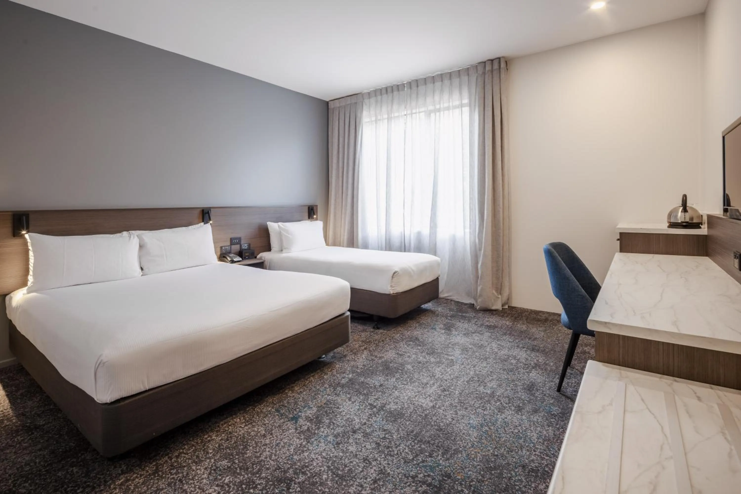 Bed in Heartland Hotel Auckland Airport