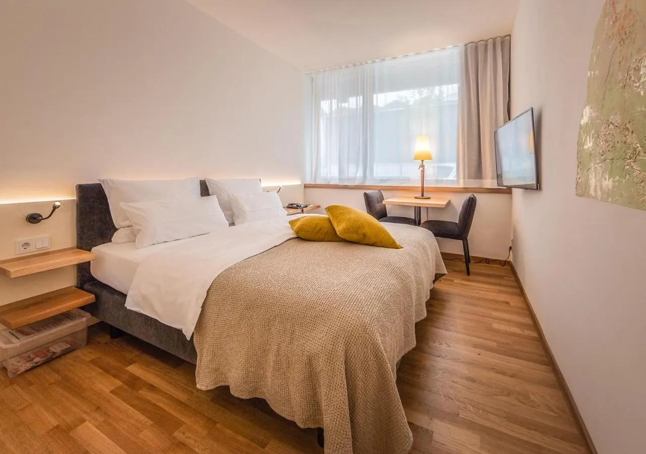 Seating area, Bed in Ferienwohnungen Boardinghouse Bodensee