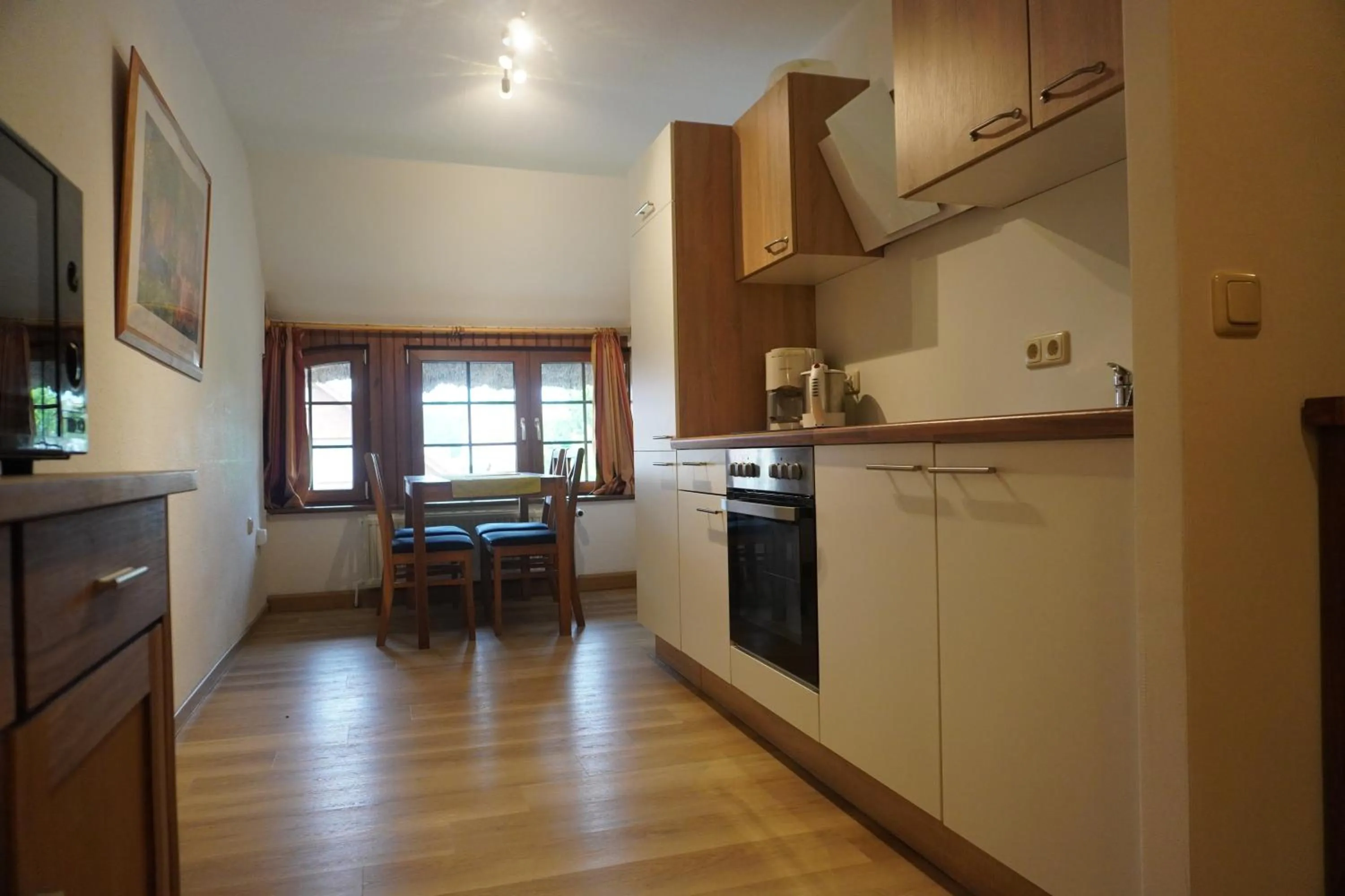 Kitchen or kitchenette in Alcor Hotel Feriendorf an der Ostsee