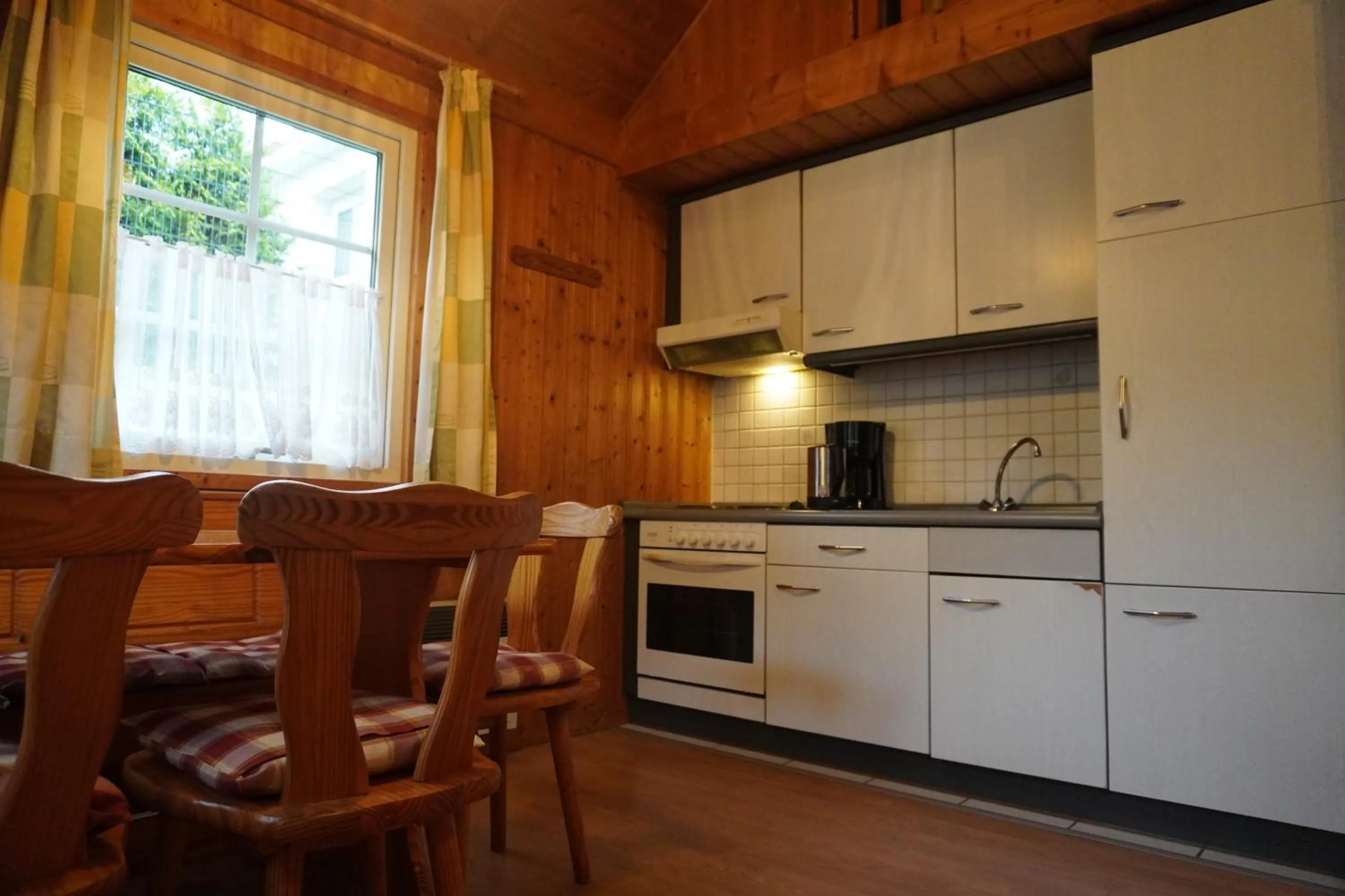 Kitchen or kitchenette in Alcor Hotel Feriendorf an der Ostsee