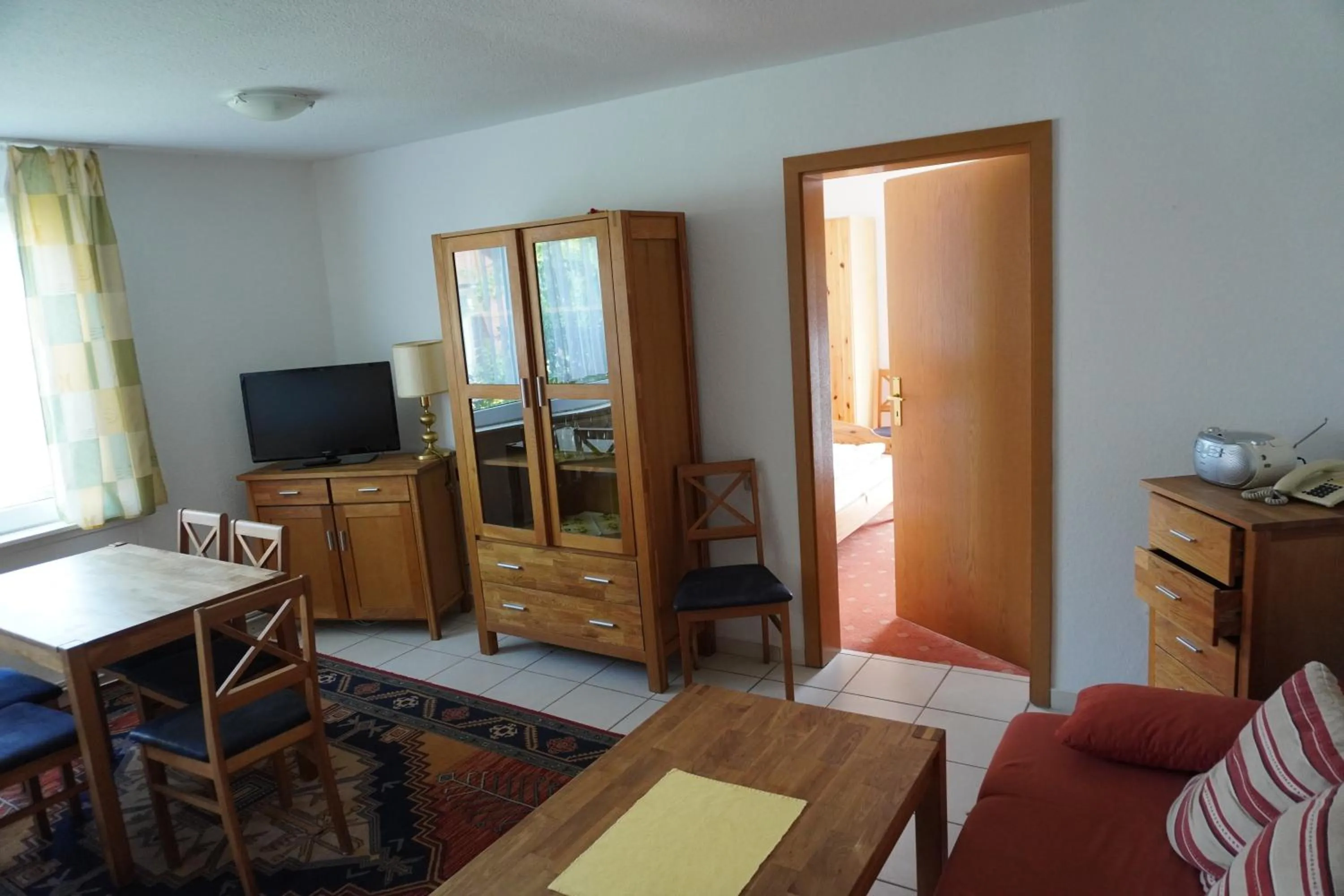 Living room, Bed in Alcor Hotel Feriendorf an der Ostsee